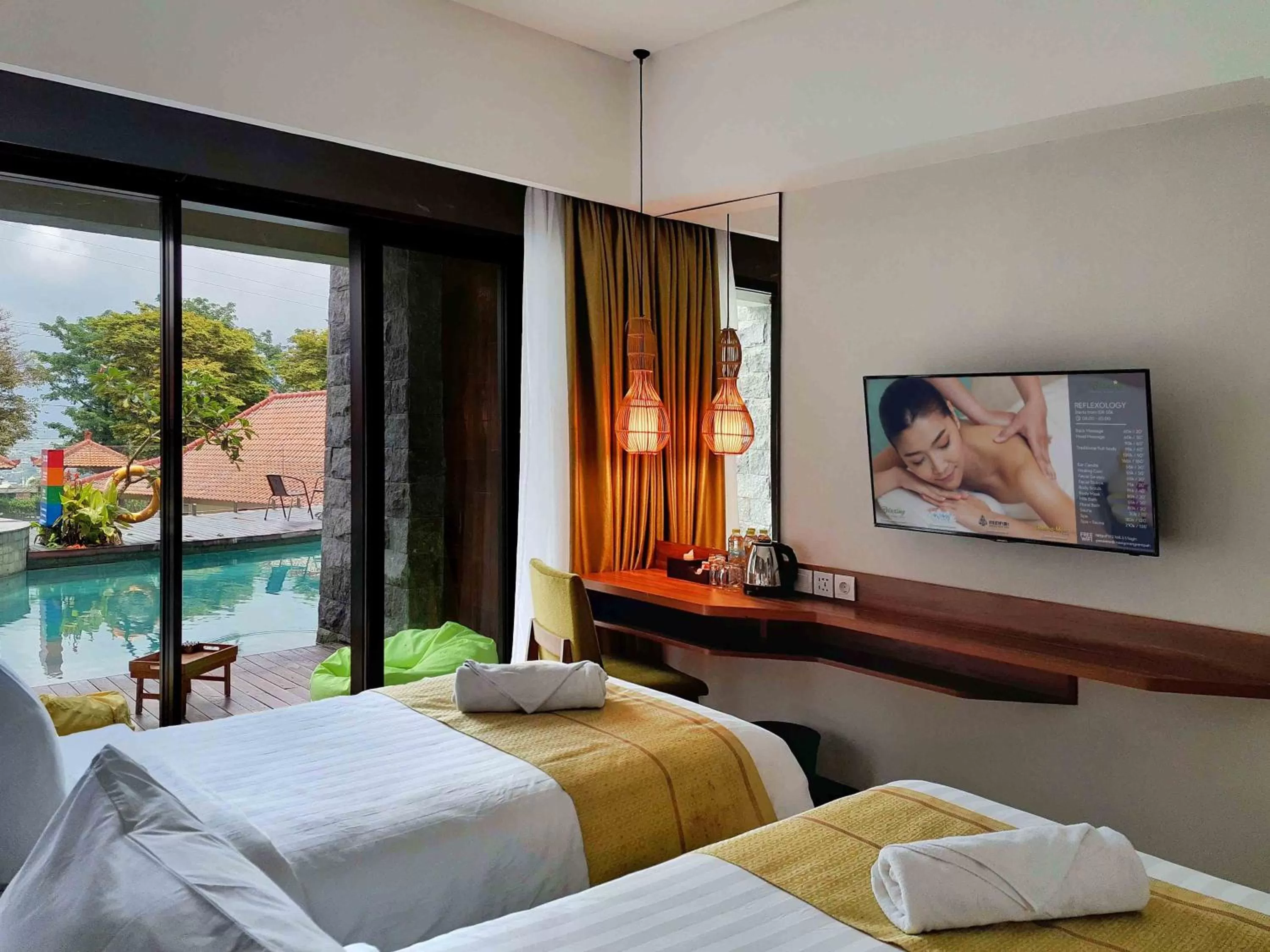 Bed in The Batu Hotel & Villas