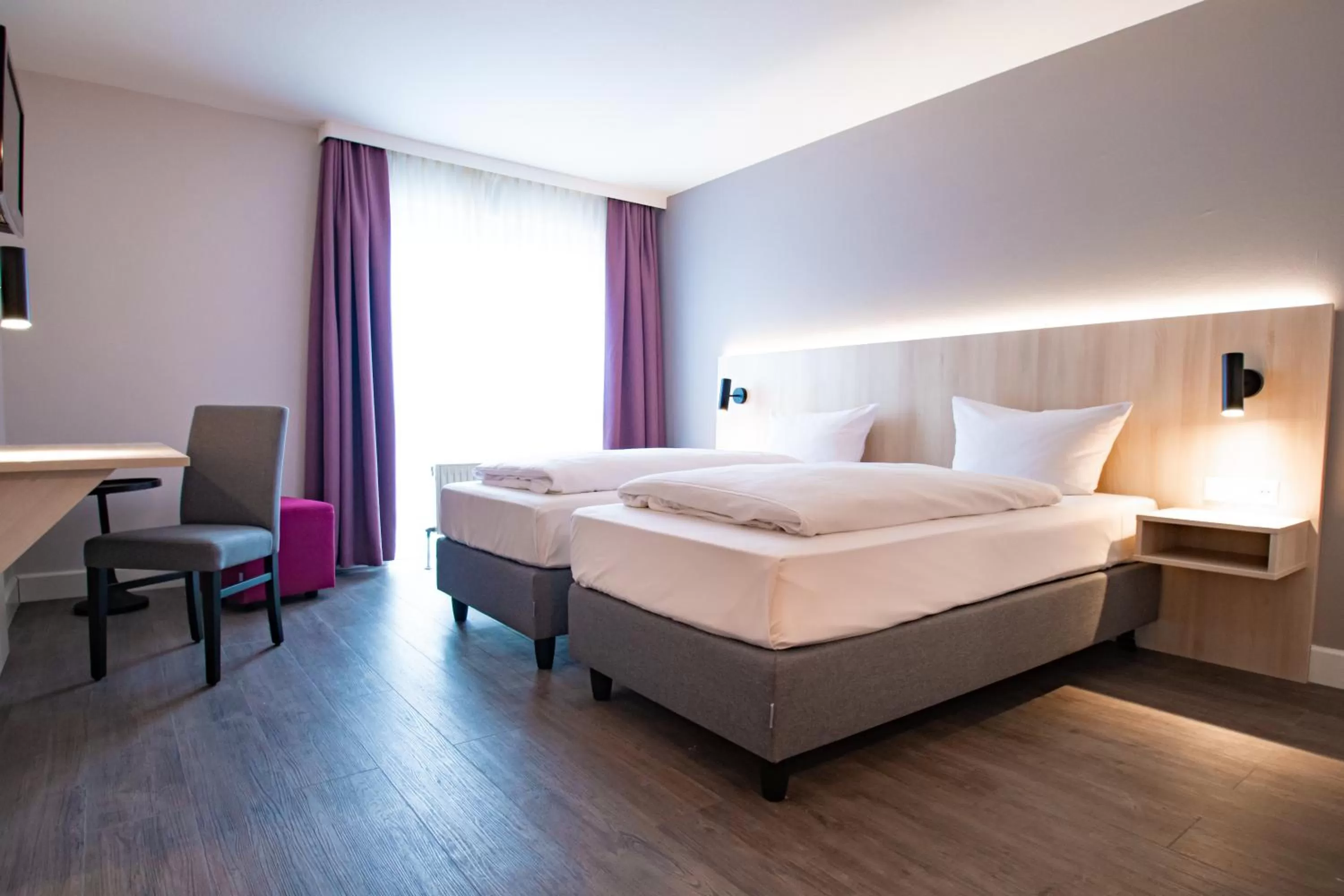 Photo of the whole room, Bed in Taste Hotel Hockenheim