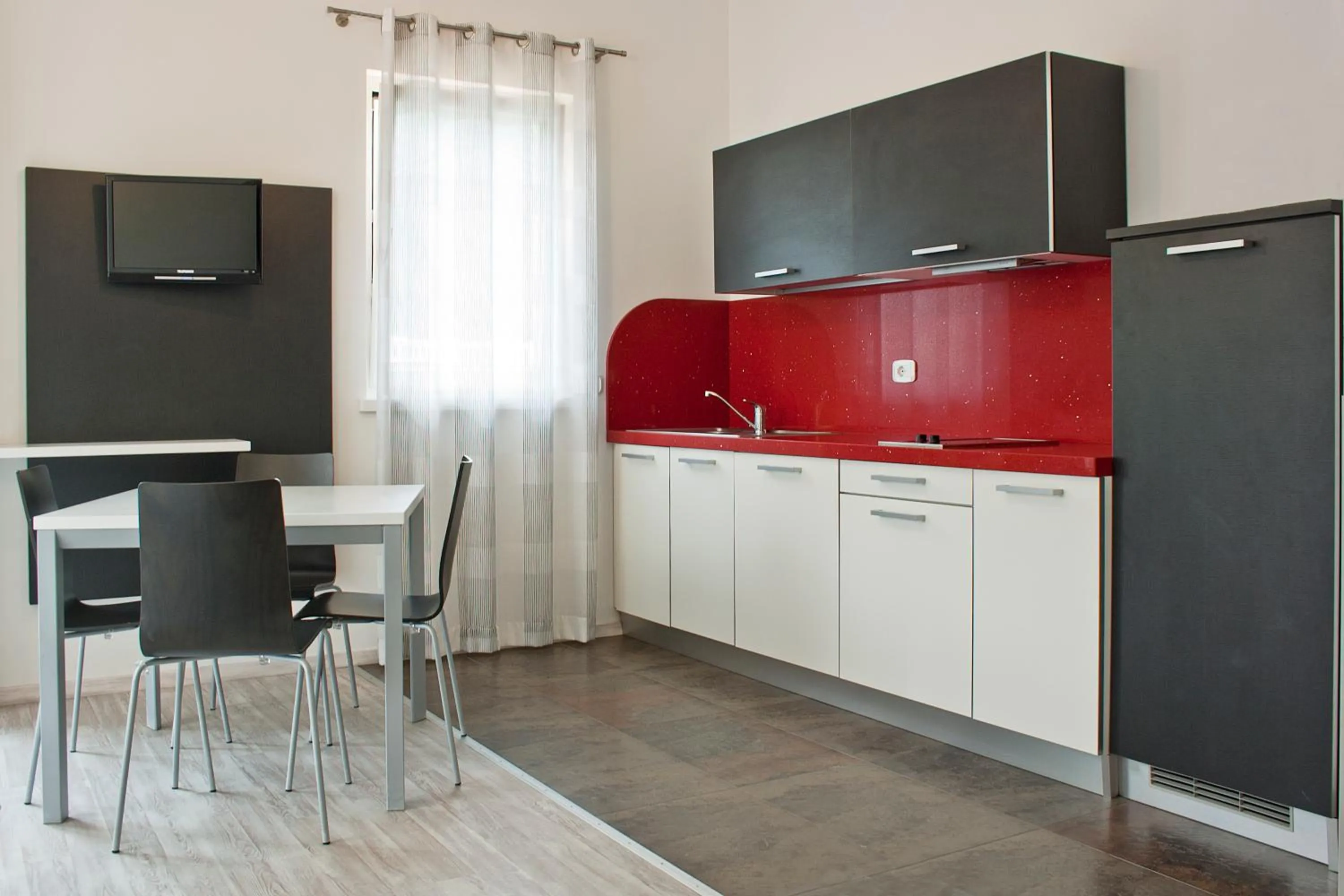 Kitchen or kitchenette in Ecohotel Primavera
