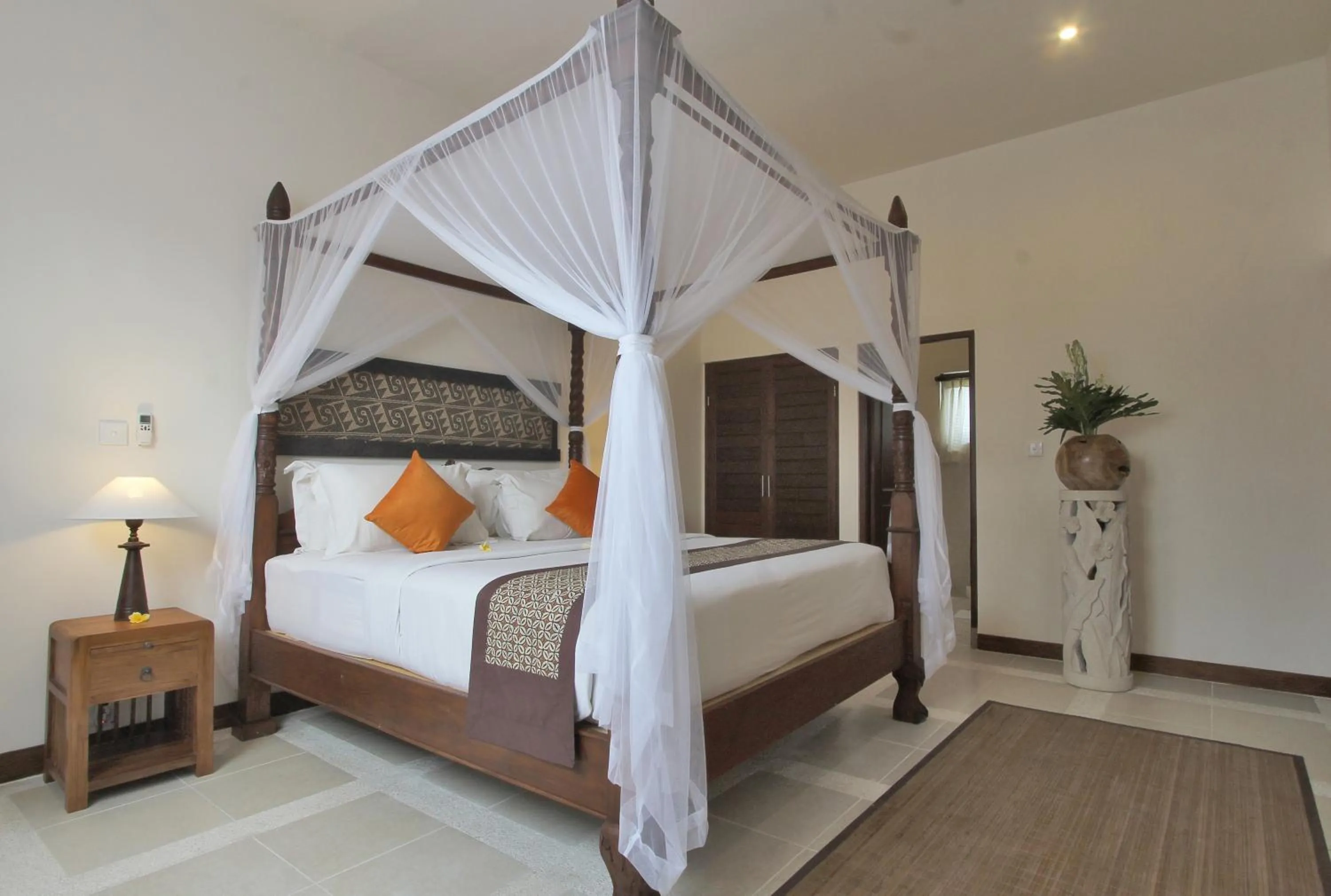 Bed in D'Legon Villas