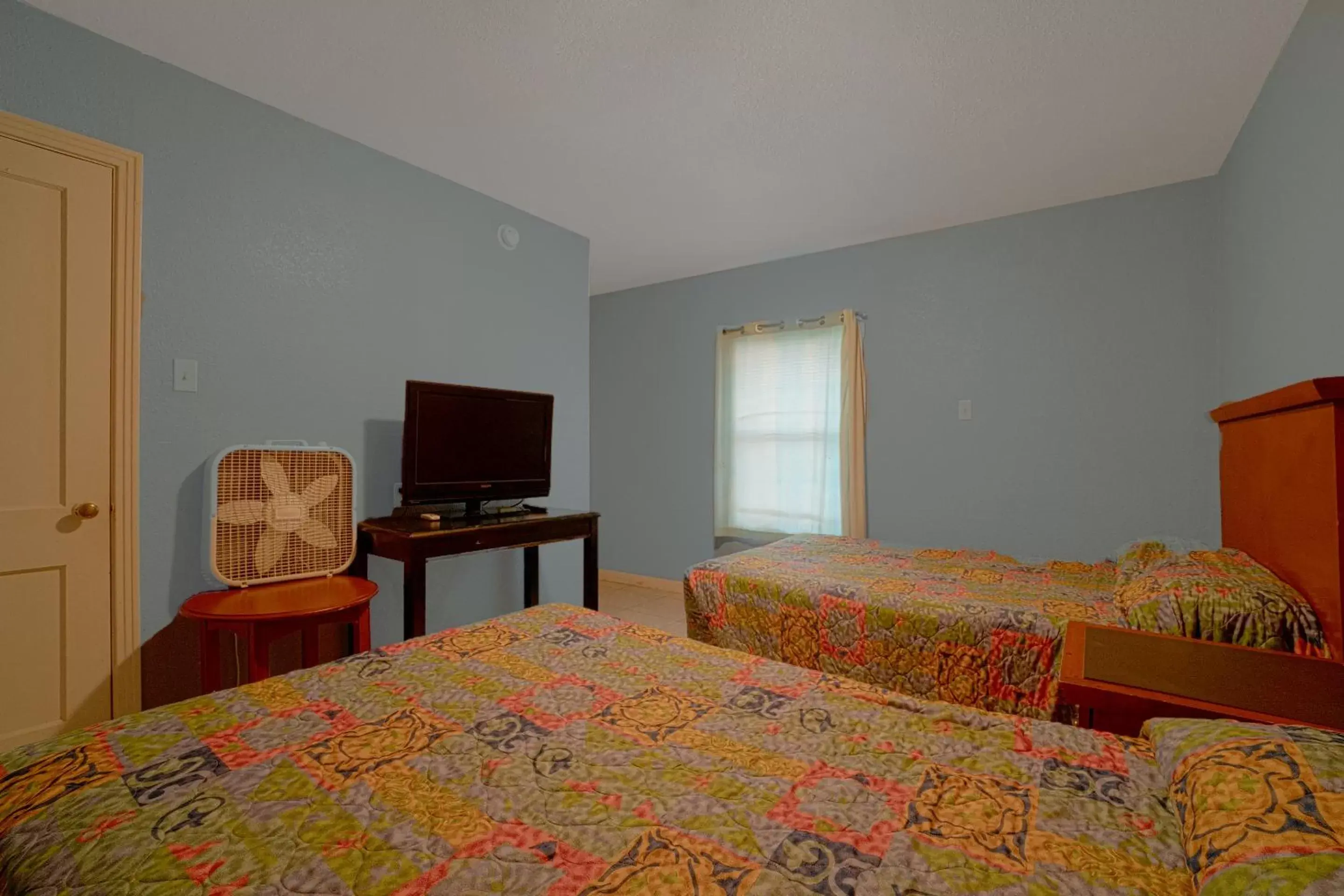 Bedroom, Bed in Texana Inn Edna By OYO