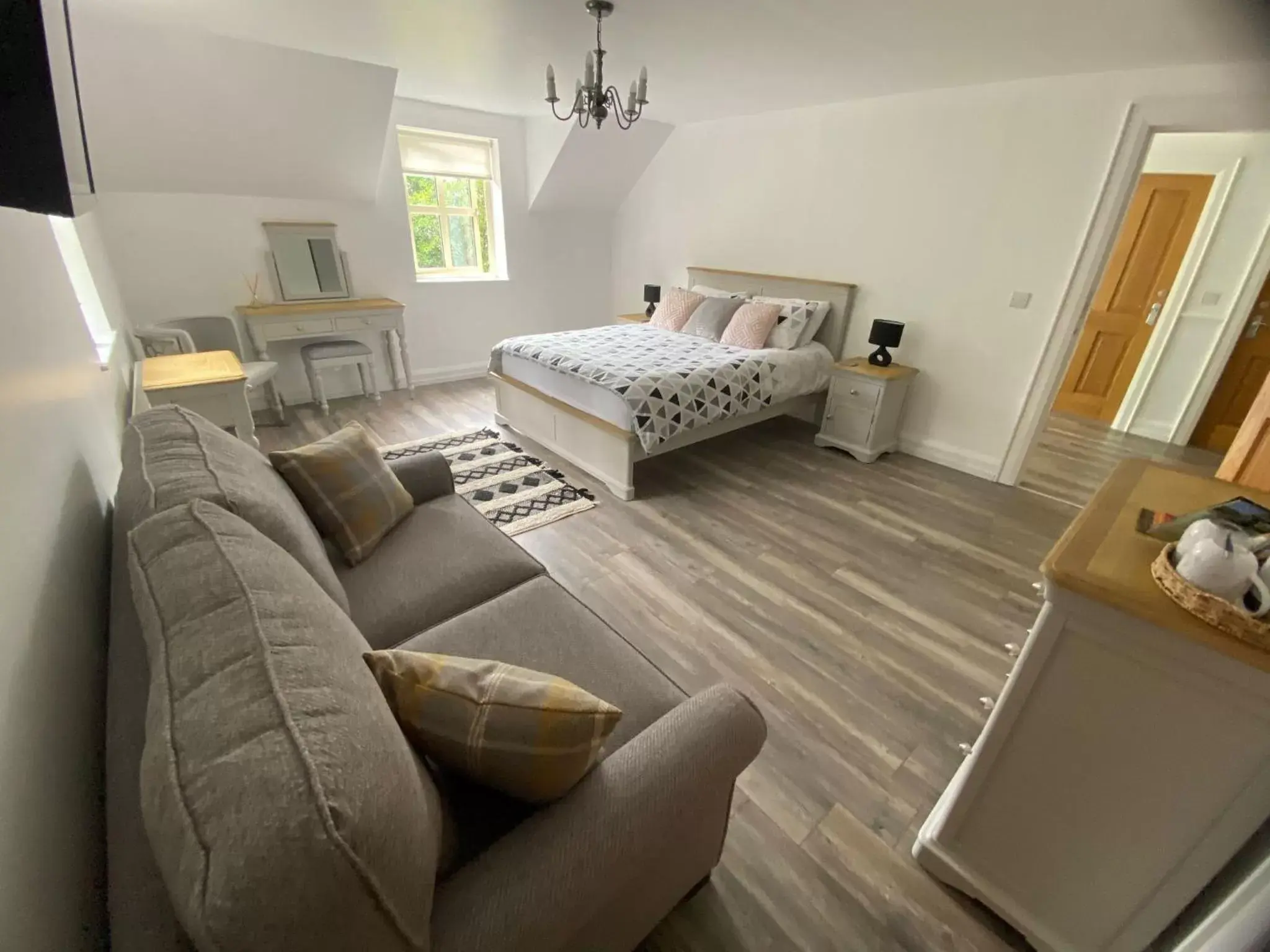 Bedroom, Seating Area in Rostrevor Valley Holiday Park Rooms with Hot tub and car service