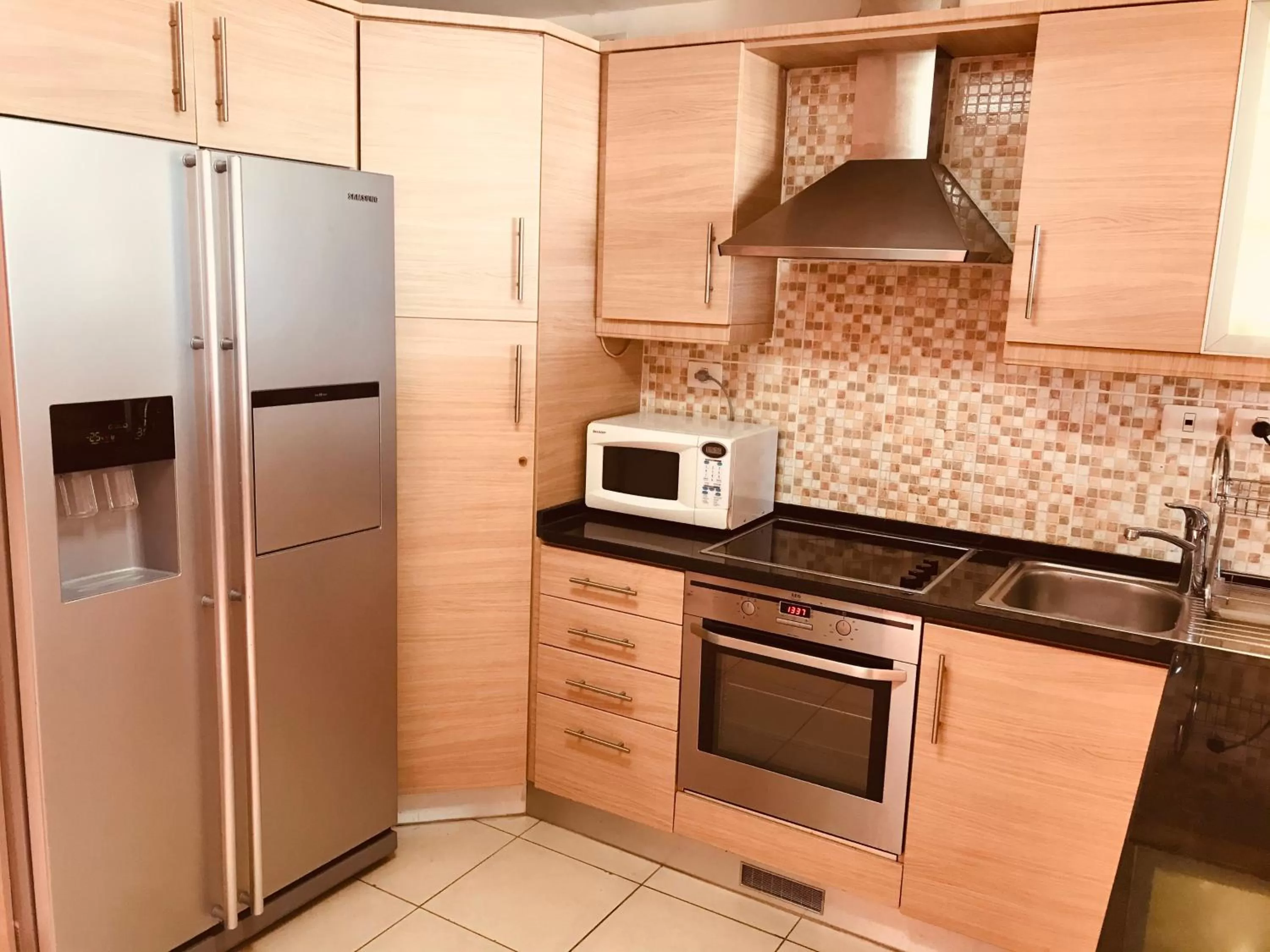 Kitchen or kitchenette in Tala Bay Residence - Families Only