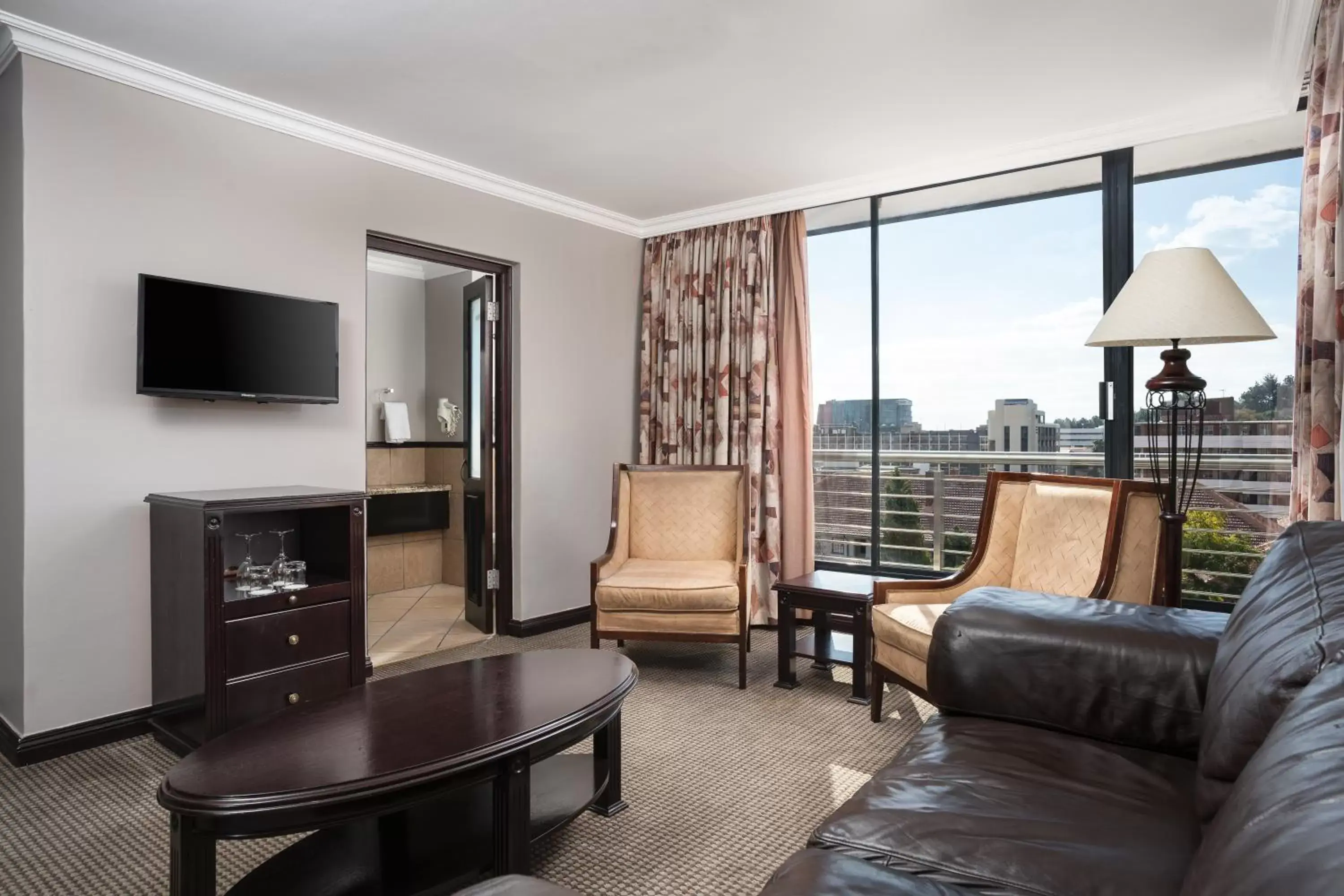 Bedroom, Seating Area in Premier Hotel Pretoria
