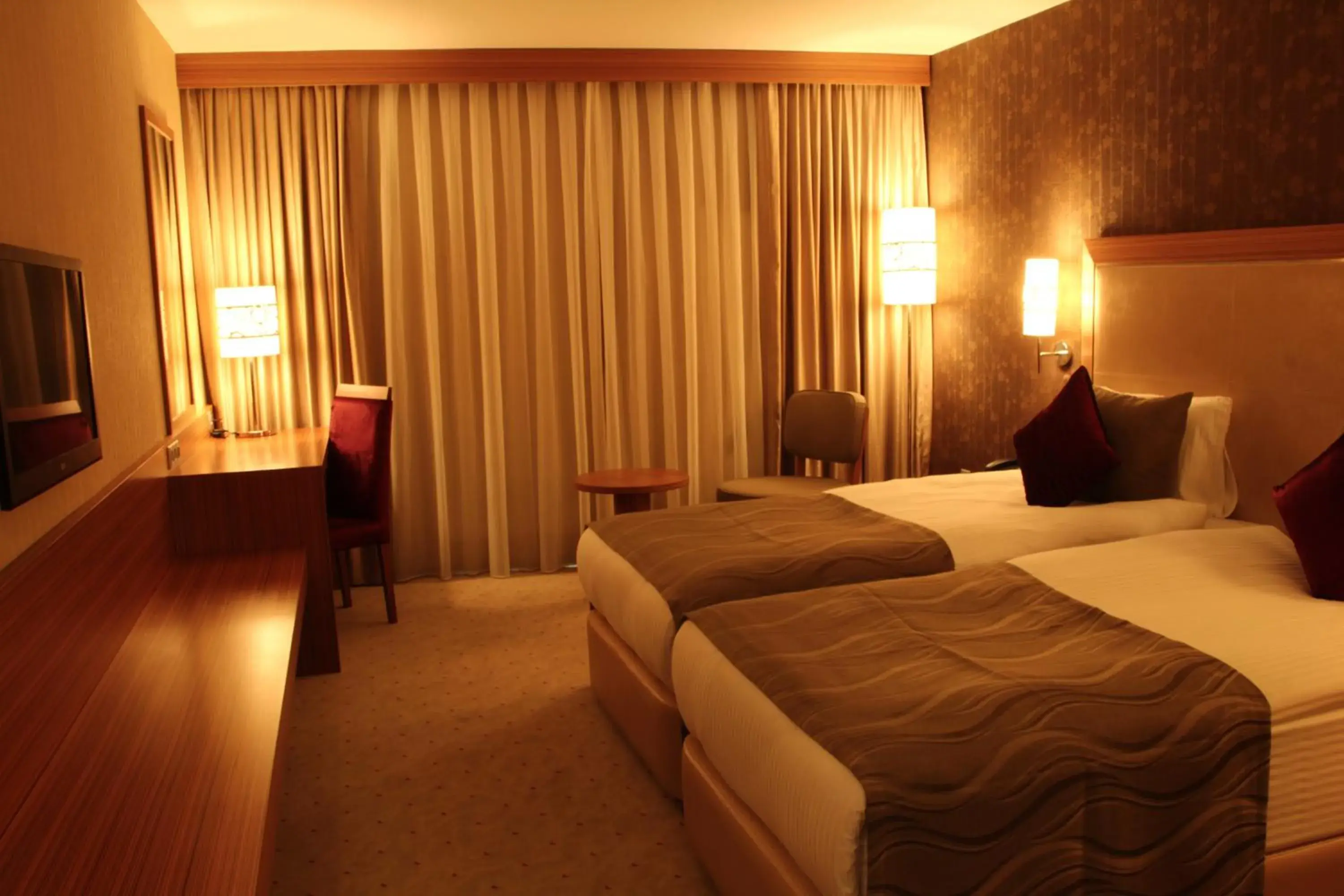 Bed in Demora Hotel