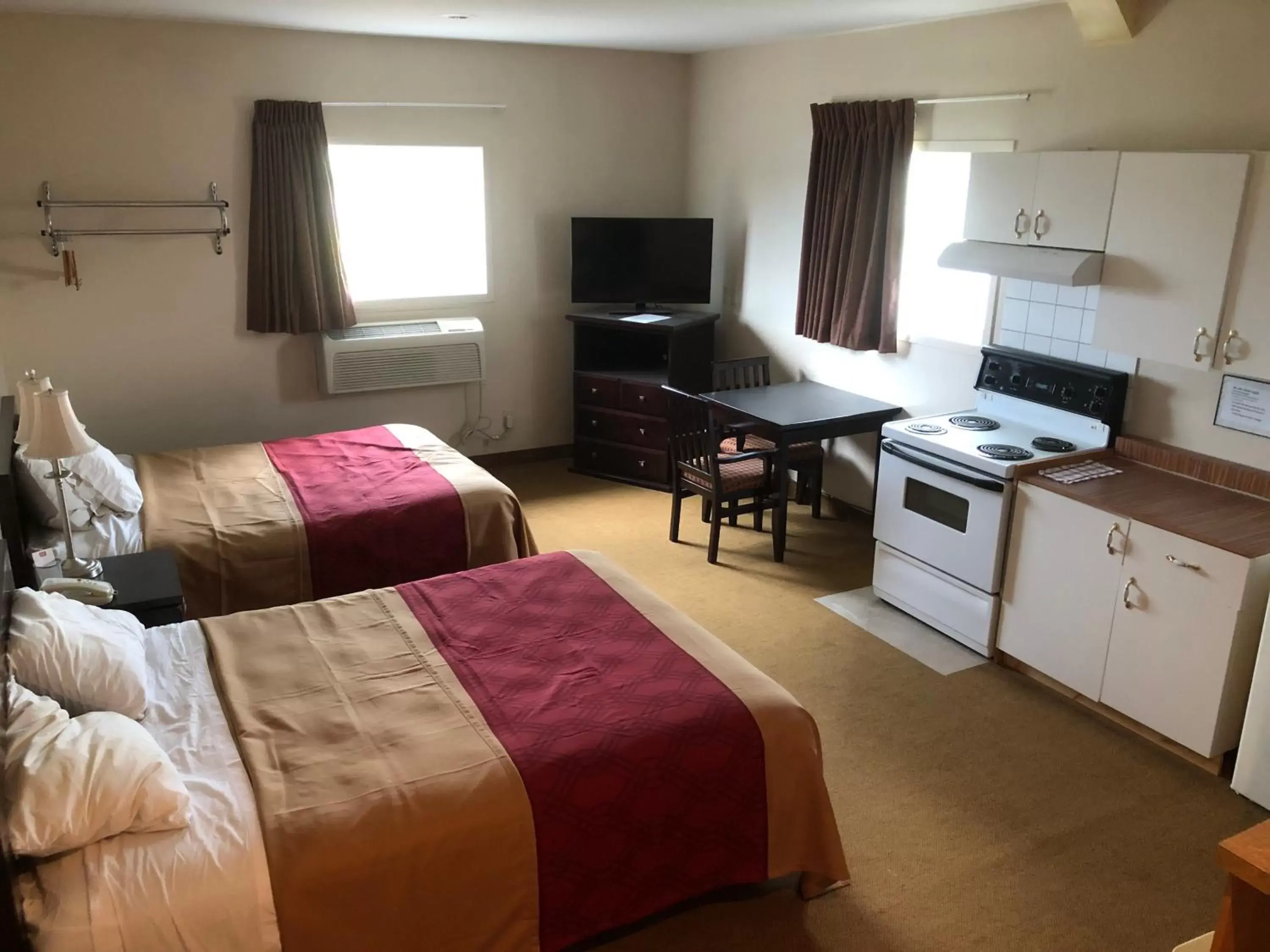 Kitchen or kitchenette in Travel Inn & Suites