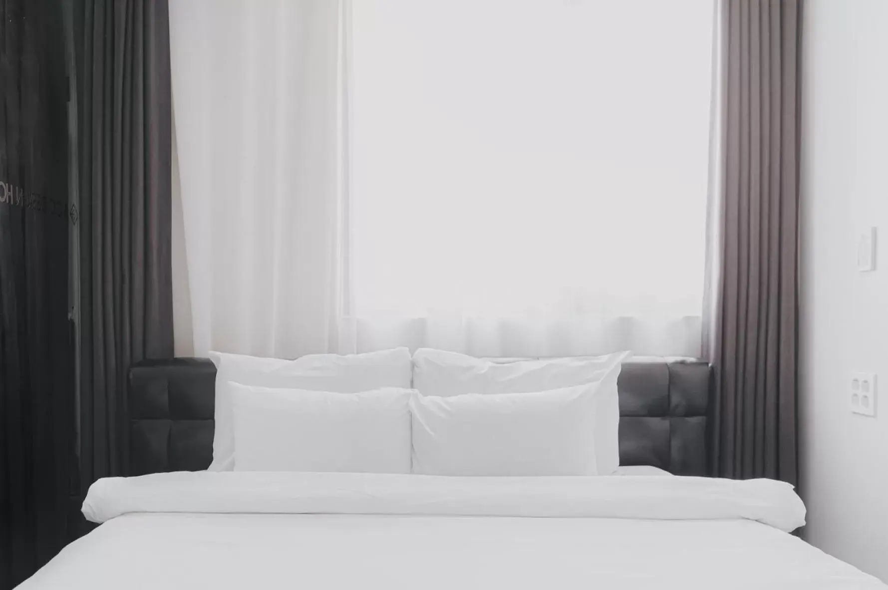 Bed in ACC Design Hotel