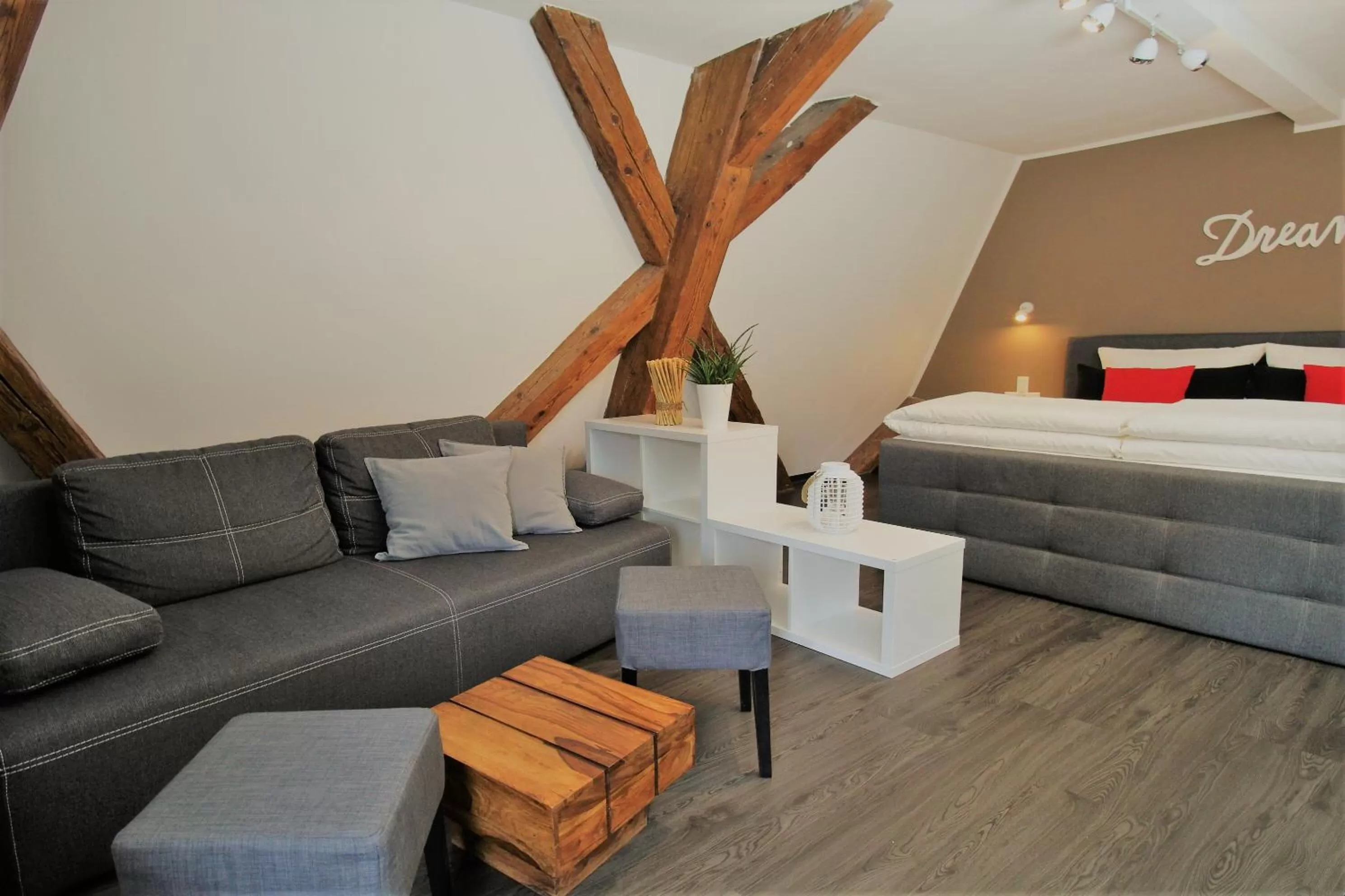 Seating area, Bed in MY HOME Hotel Lamm Rottweil "Smart Home"