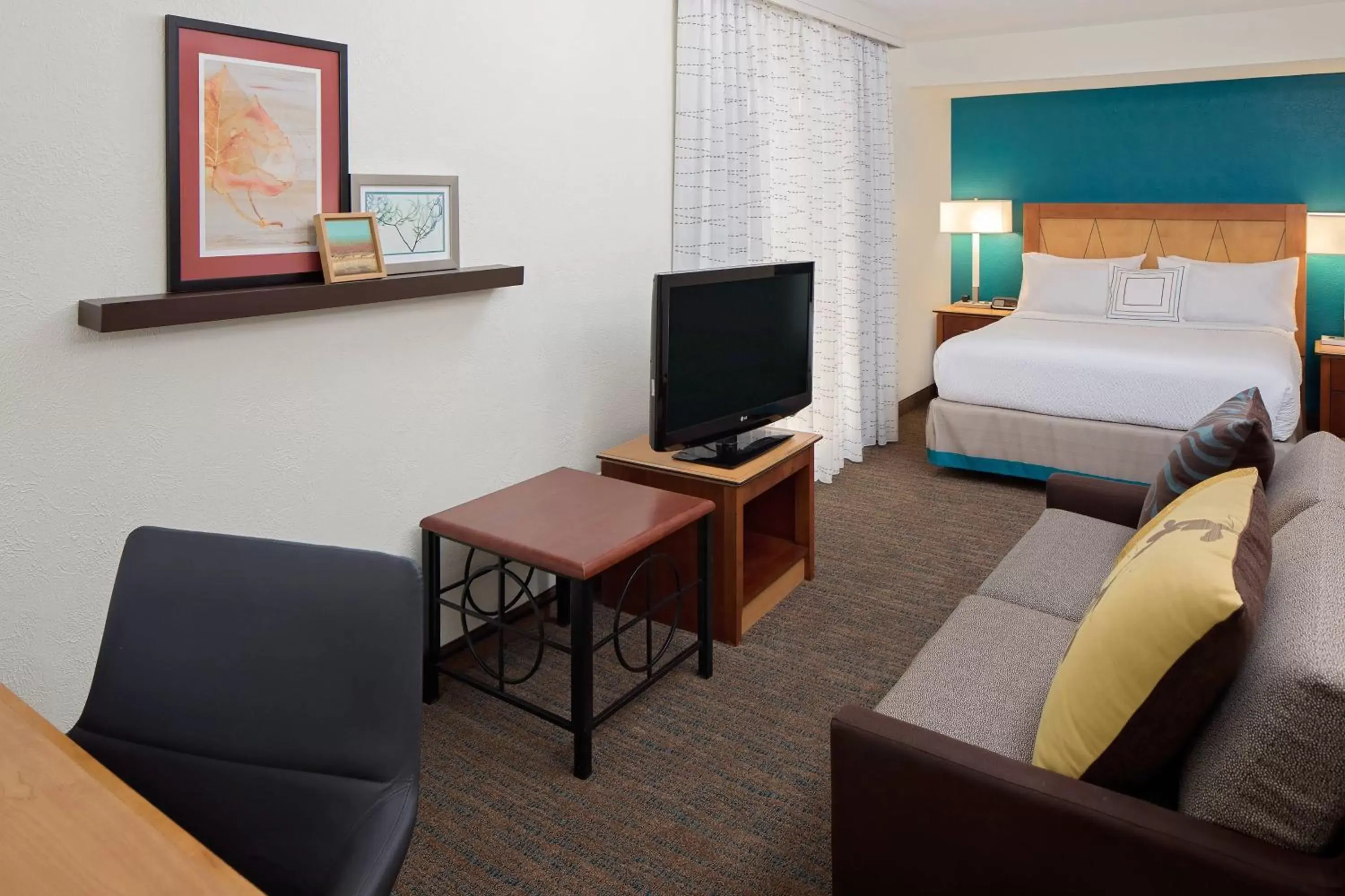 Photo of the whole room, TV/Entertainment Center in Residence Inn Louisville East