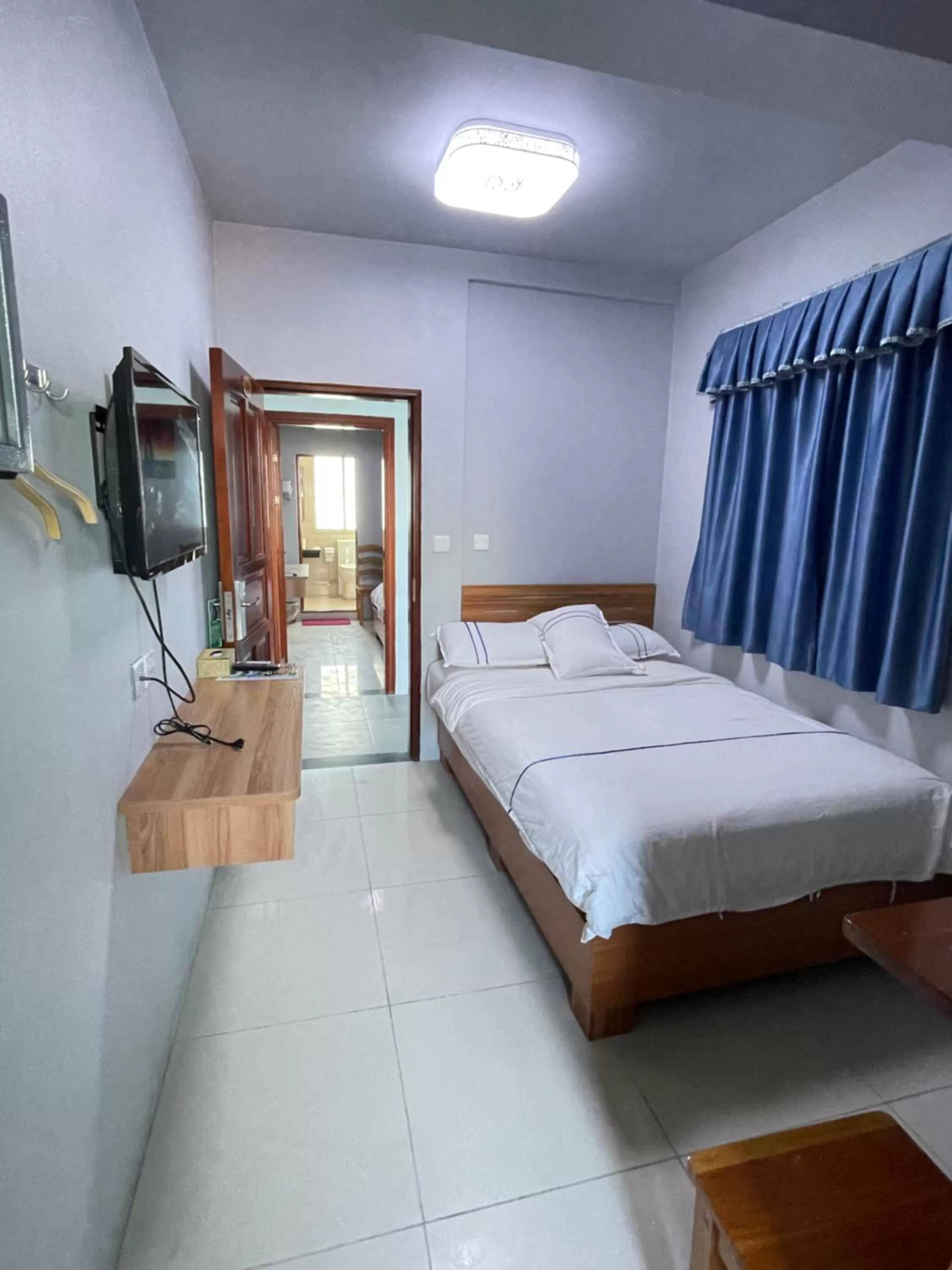 Bed in Caye Caulker Beach Hotel