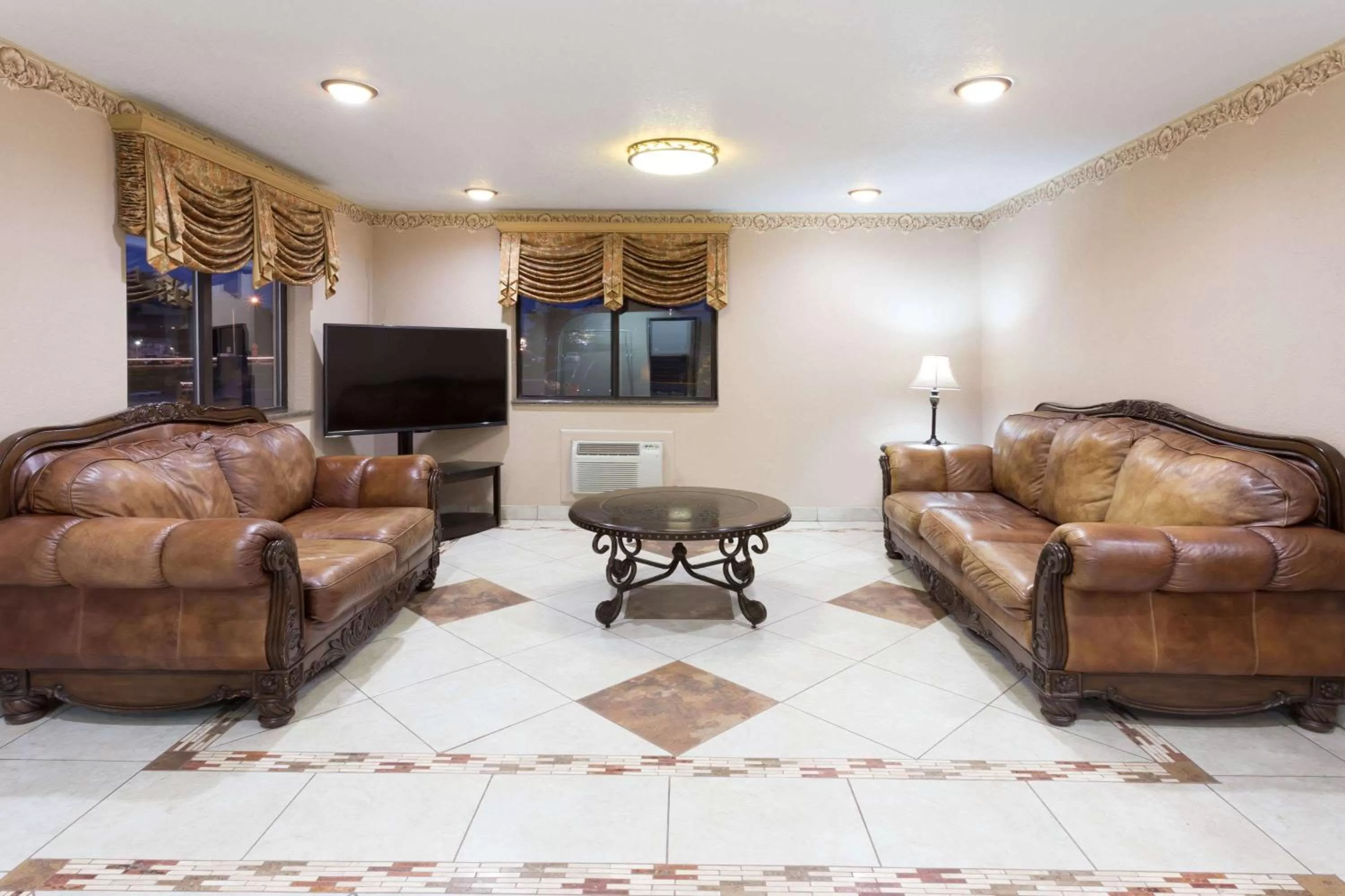 Seating area in Super 8 by Wyndham Rock Falls Sterling Area