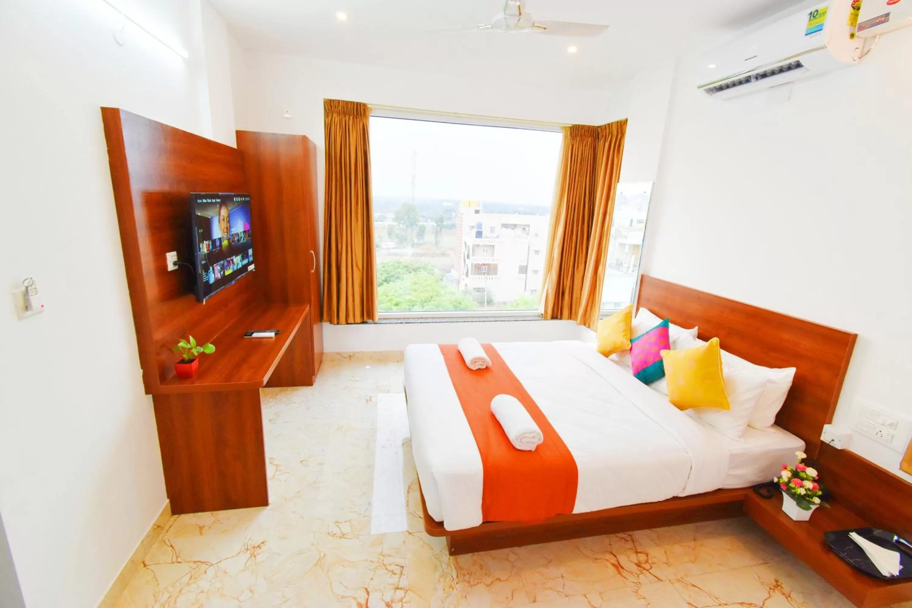 Photo of the whole room, Bed in Keerthis Royal Suites Hotels in Bangalore Airport