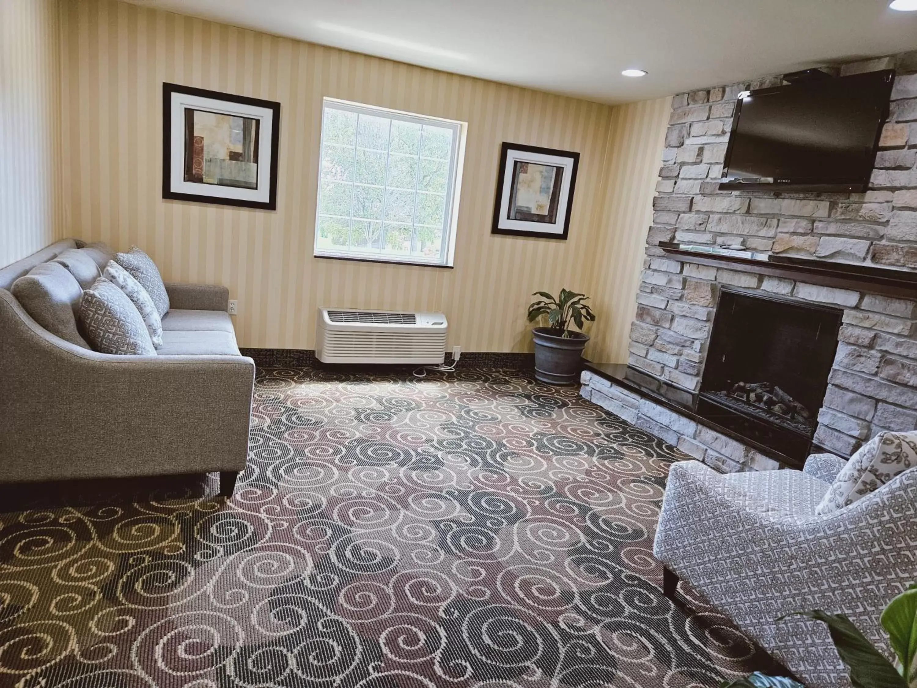 Lobby or reception, Seating Area in Cobblestone Inn & Suites - Bloomfield