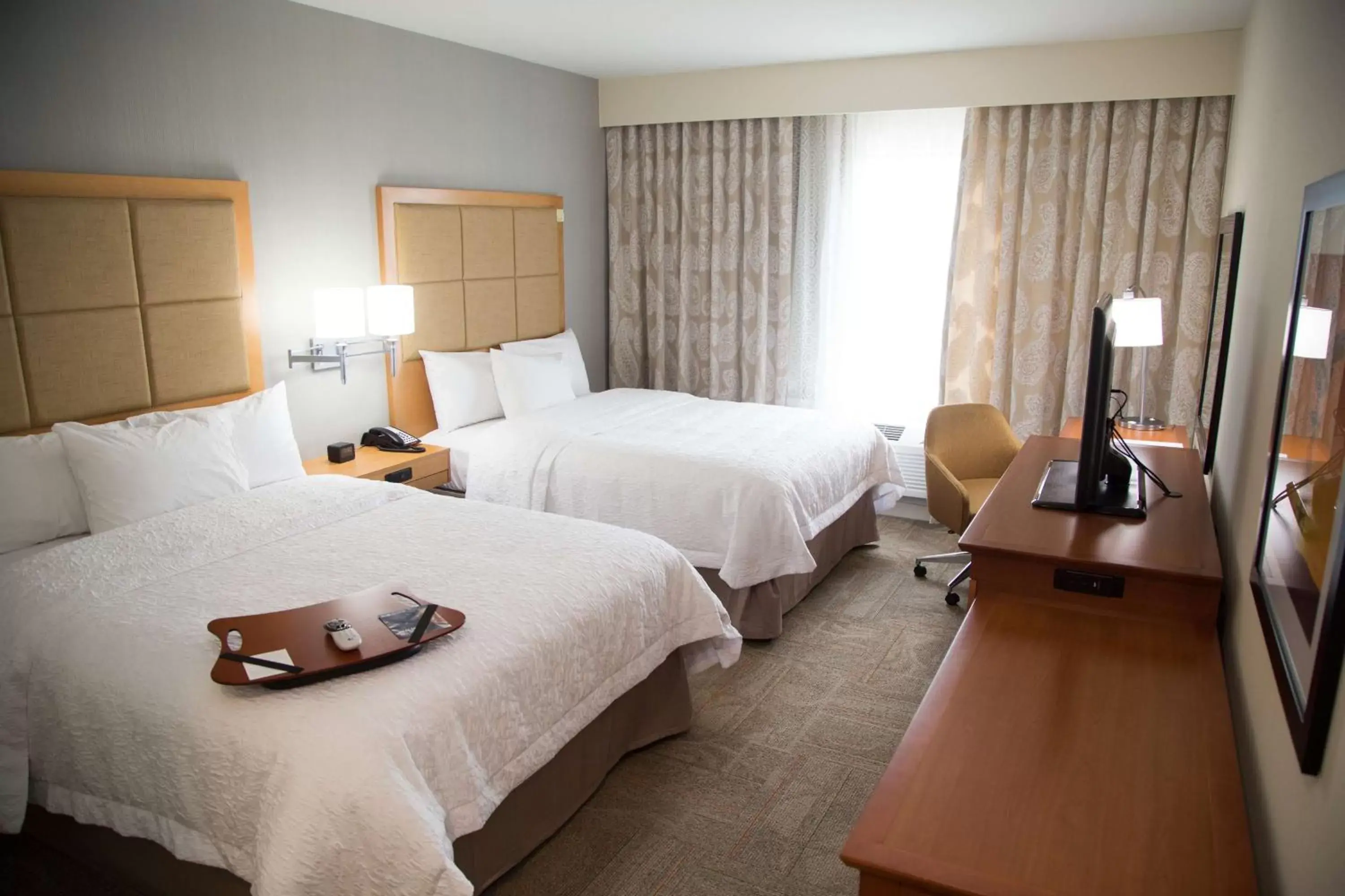 Bed in Hampton Inn and Suites by Hilton McKinney