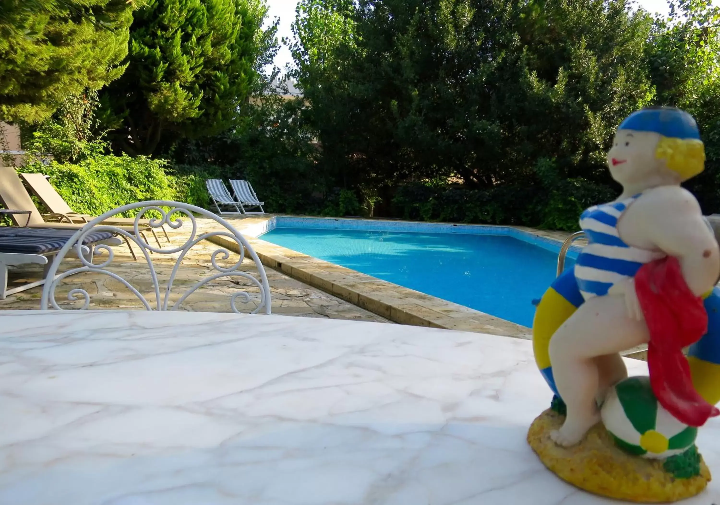 Garden, Swimming Pool in Hotel Kalehan