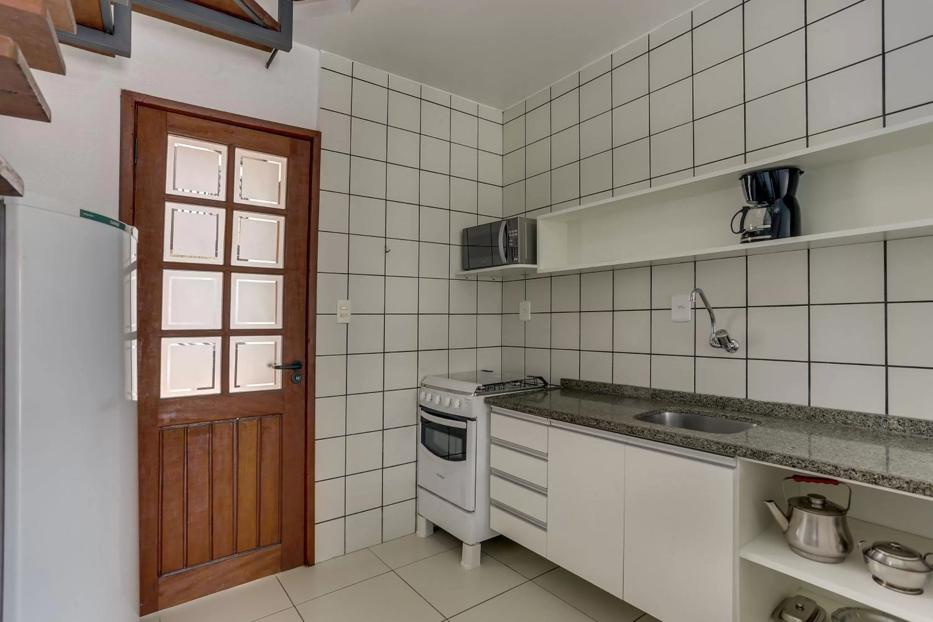 Kitchen or kitchenette in Pousada Saint Paul