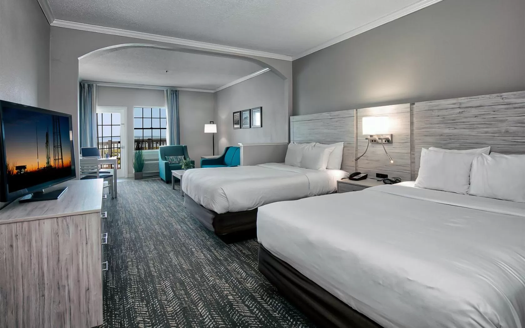 Photo of the whole room, Bed in Comfort Suites Chincoteague Island Bayfront Resort