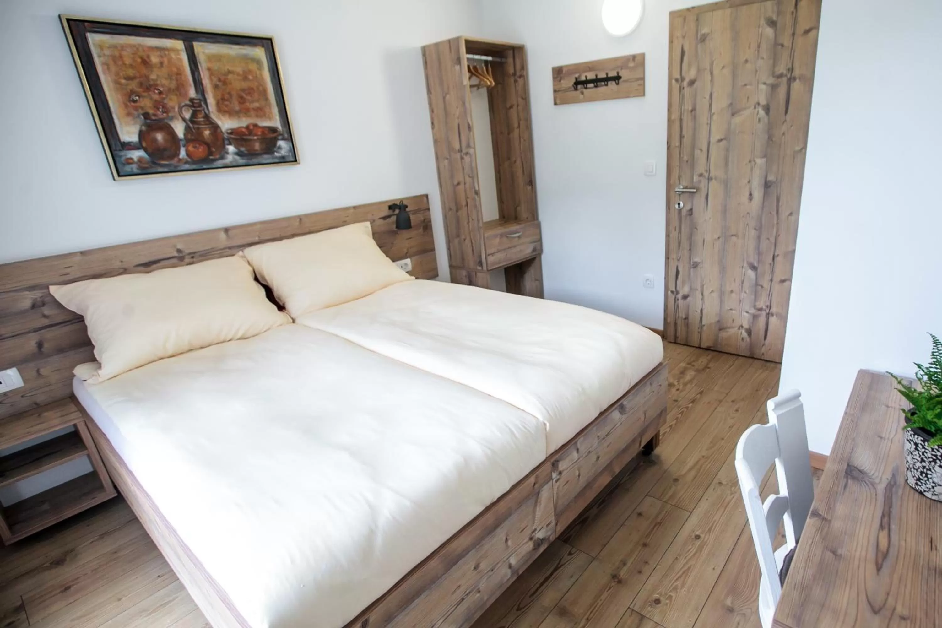 Bed in Hiša Poljana Rooms