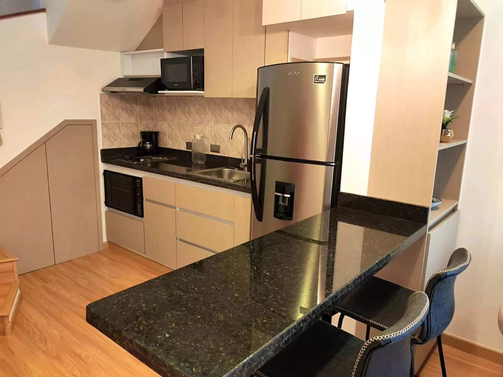 Kitchen or kitchenette in Cora 96 Street Apartments