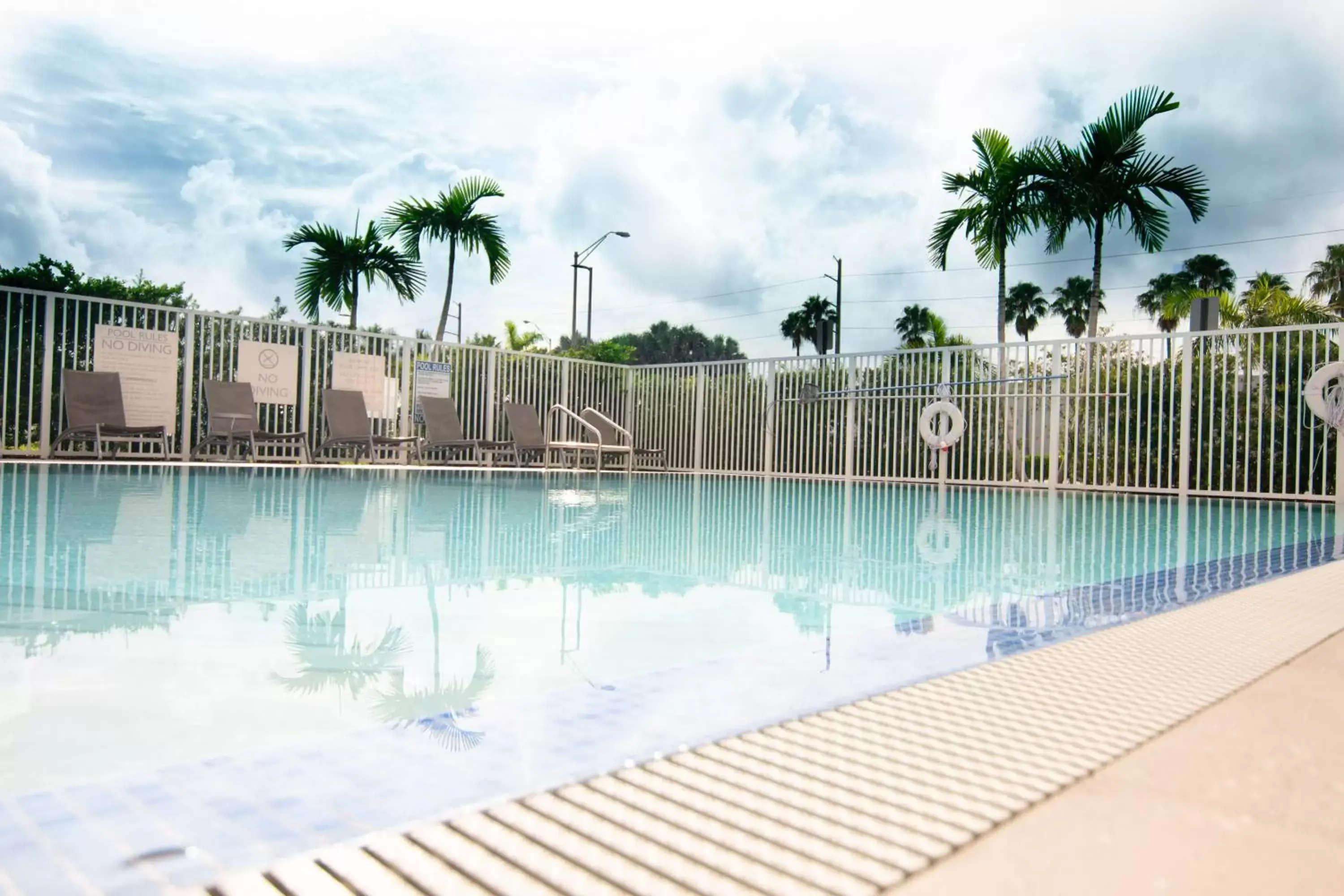 Day, Swimming Pool in Candlewood Suites Miami Intl Airport - 36th St, an IHG Hotel
