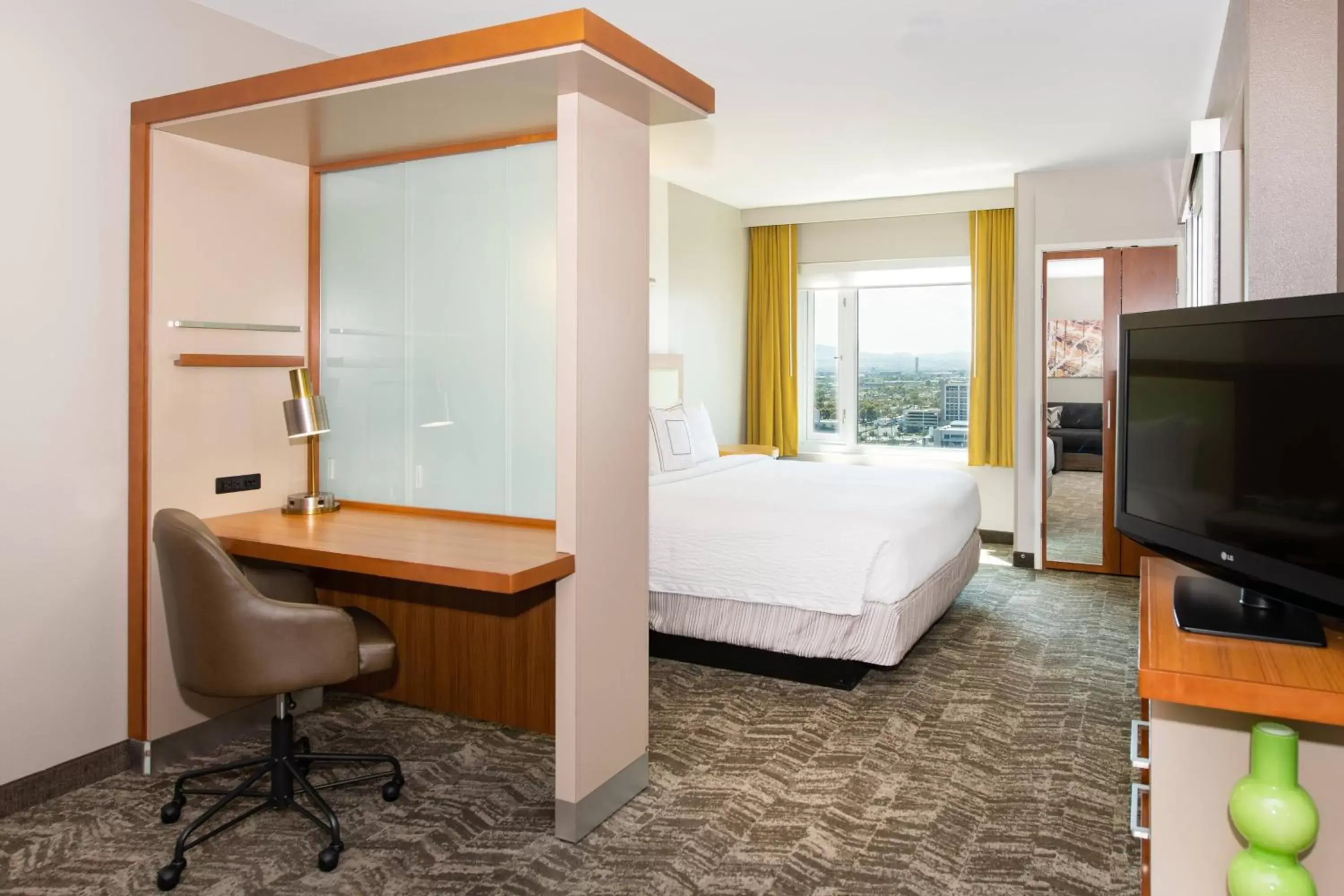 Photo of the whole room, Bed in SpringHill Suites by Marriott Las Vegas Convention Center