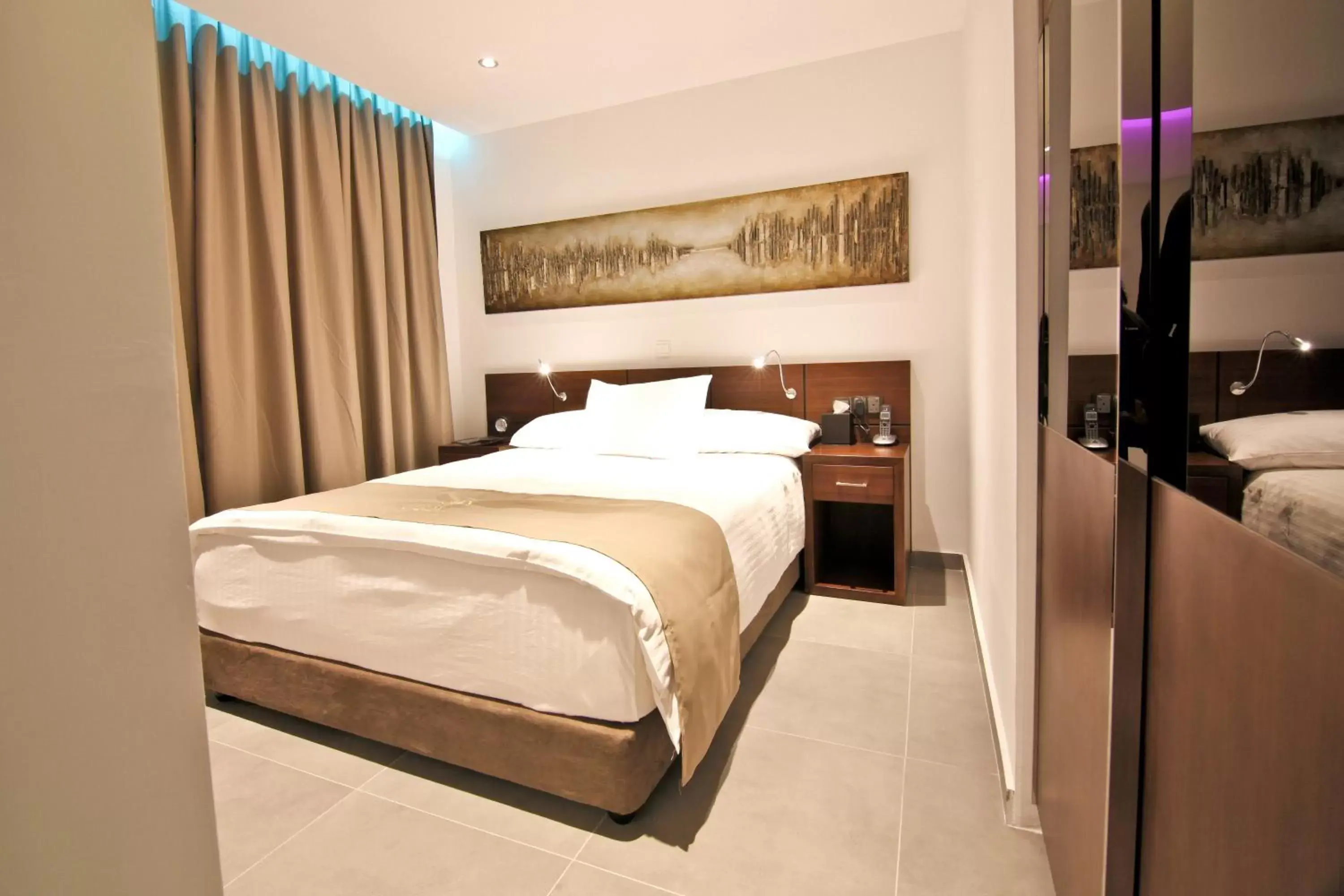 Bed in Achilleos City Hotel