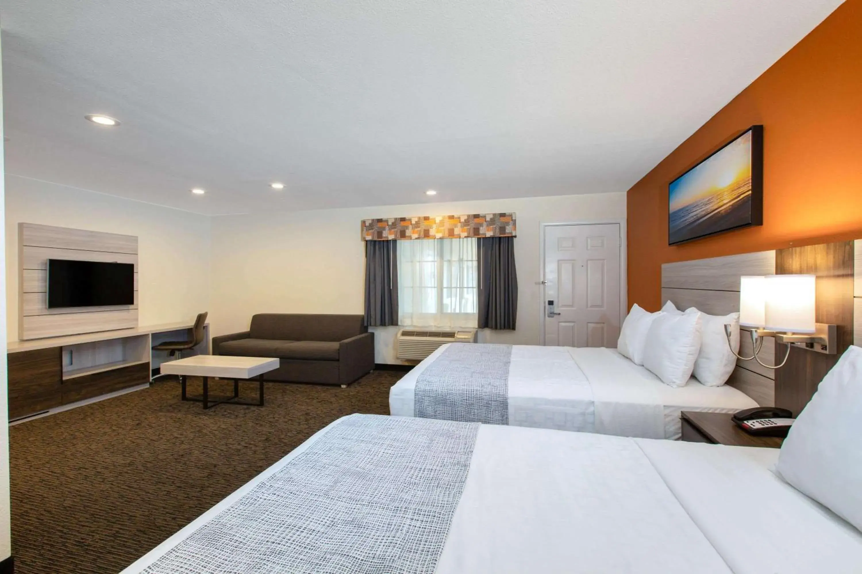 Photo of the whole room, TV/Entertainment Center in Days Inn by Wyndham Monterey-Fisherman's Wharf Aquarium