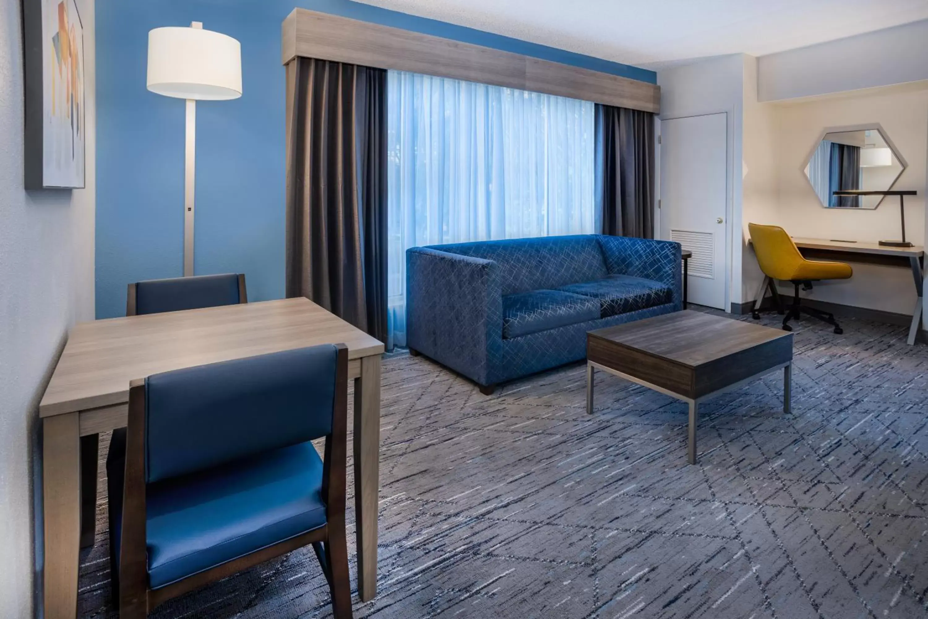 Living room, Seating Area in Holiday Inn Express and Suites Tampa I-75 at Bruce B. Downs, an IHG Hotel