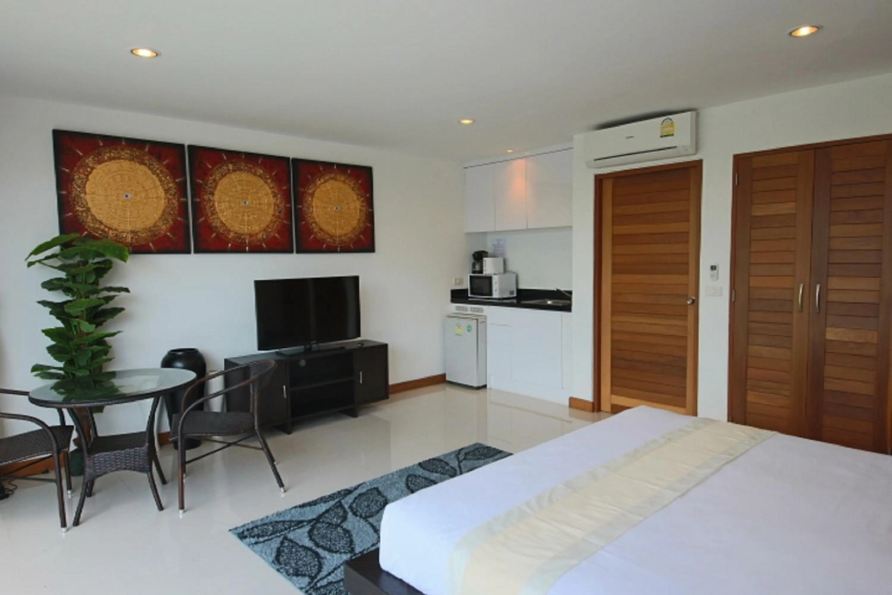 Kitchen or kitchenette, Bed in Tropical Sea View Residence