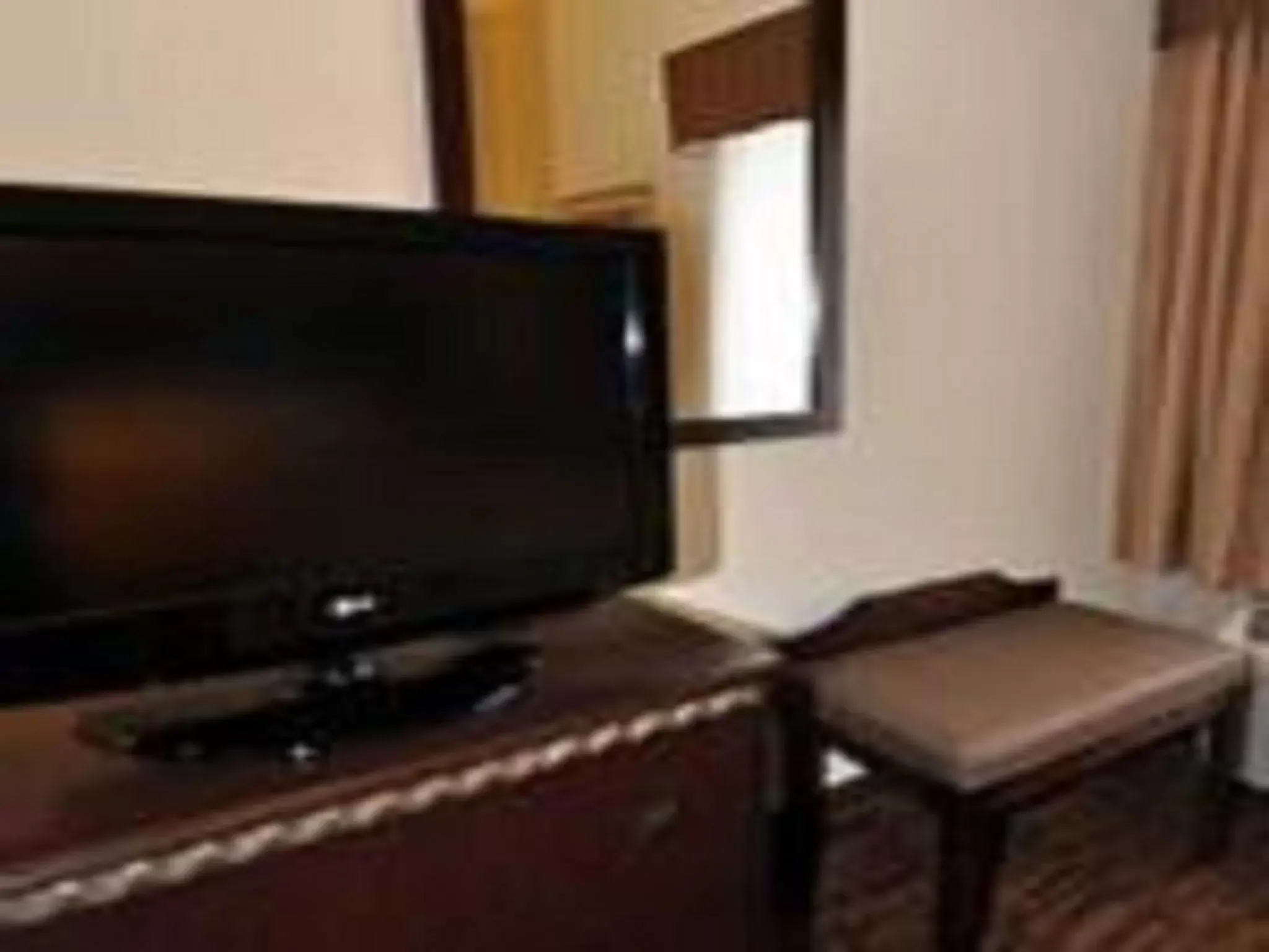 TV and multimedia, TV/Entertainment Center in Days Inn by Wyndham Semmes Mobile