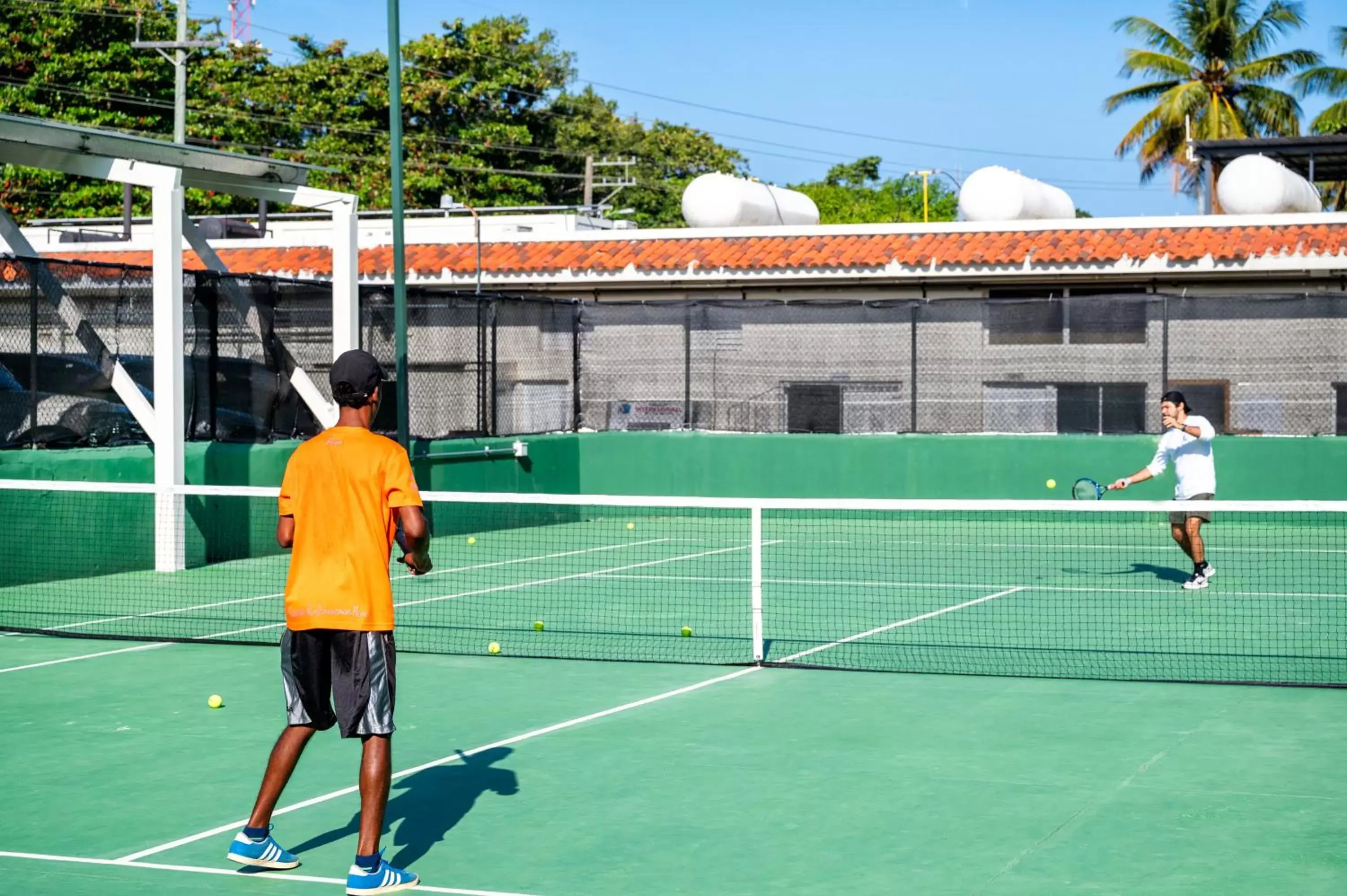 Tennis court, Tennis/Squash in Viva Tangerine by Wyndham, A Trademark All Inclusive