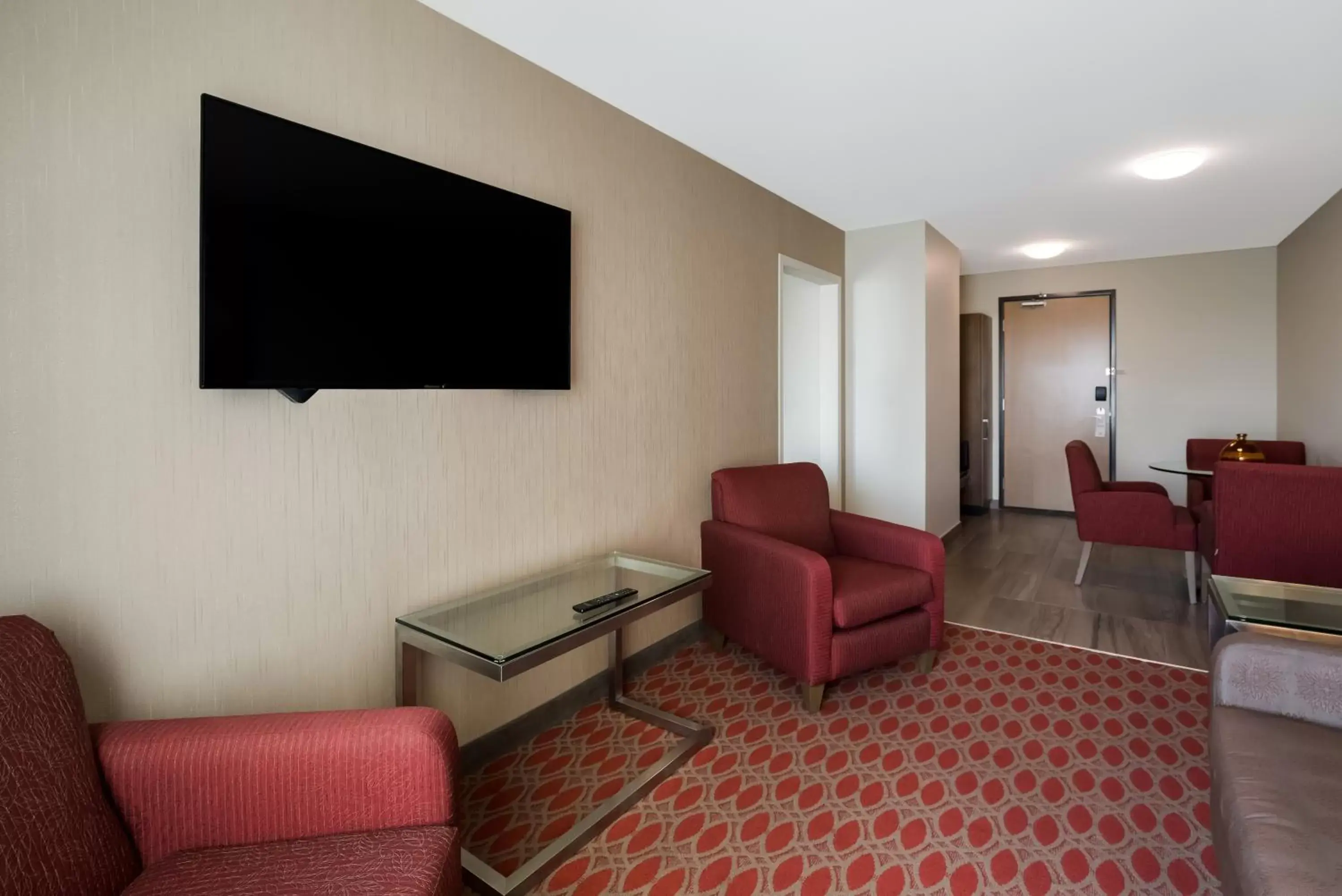 Living room, Seating Area in Hotel 11 by Sonesta