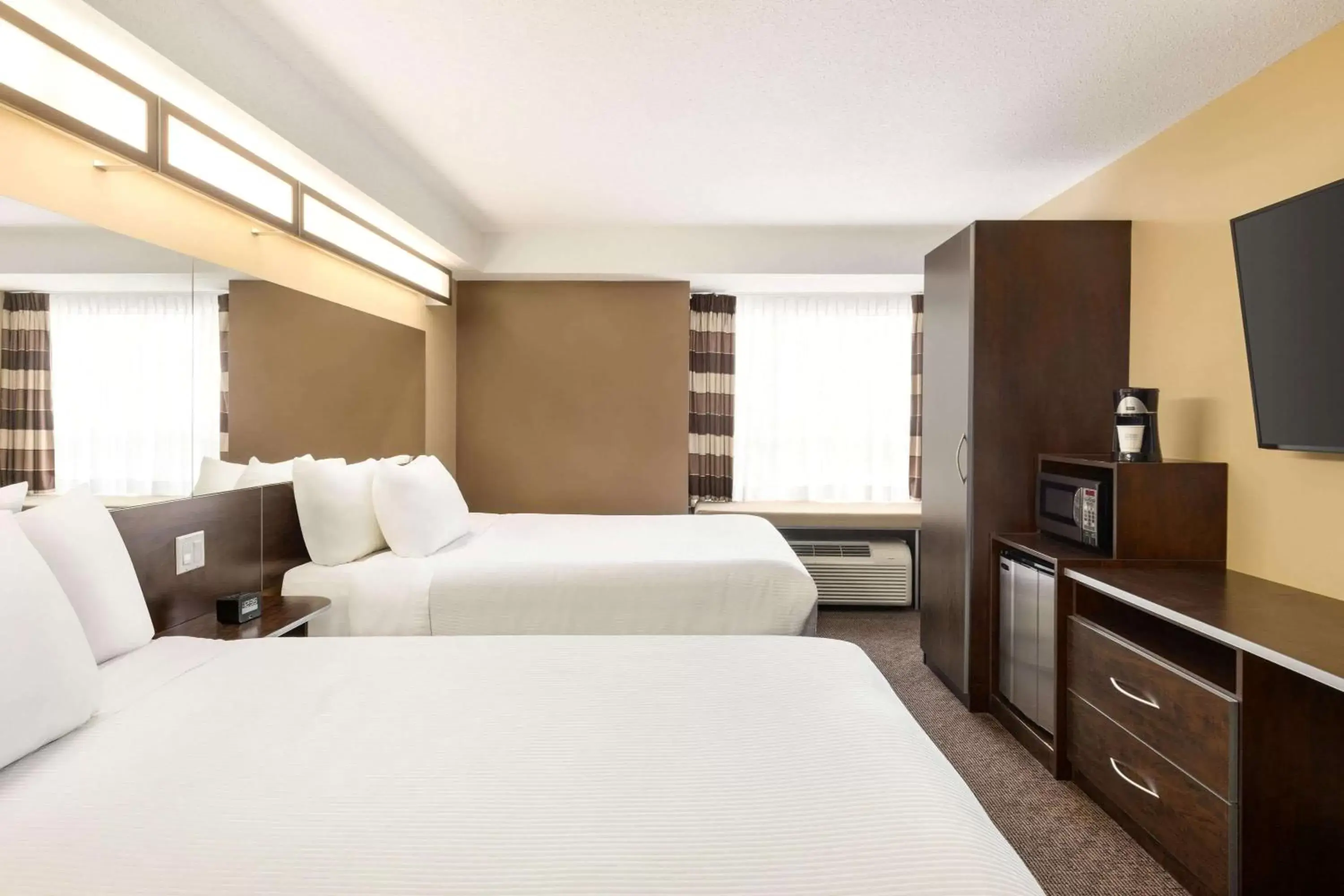 Photo of the whole room, Bed in Microtel Inn & Suites by Wyndham Estevan