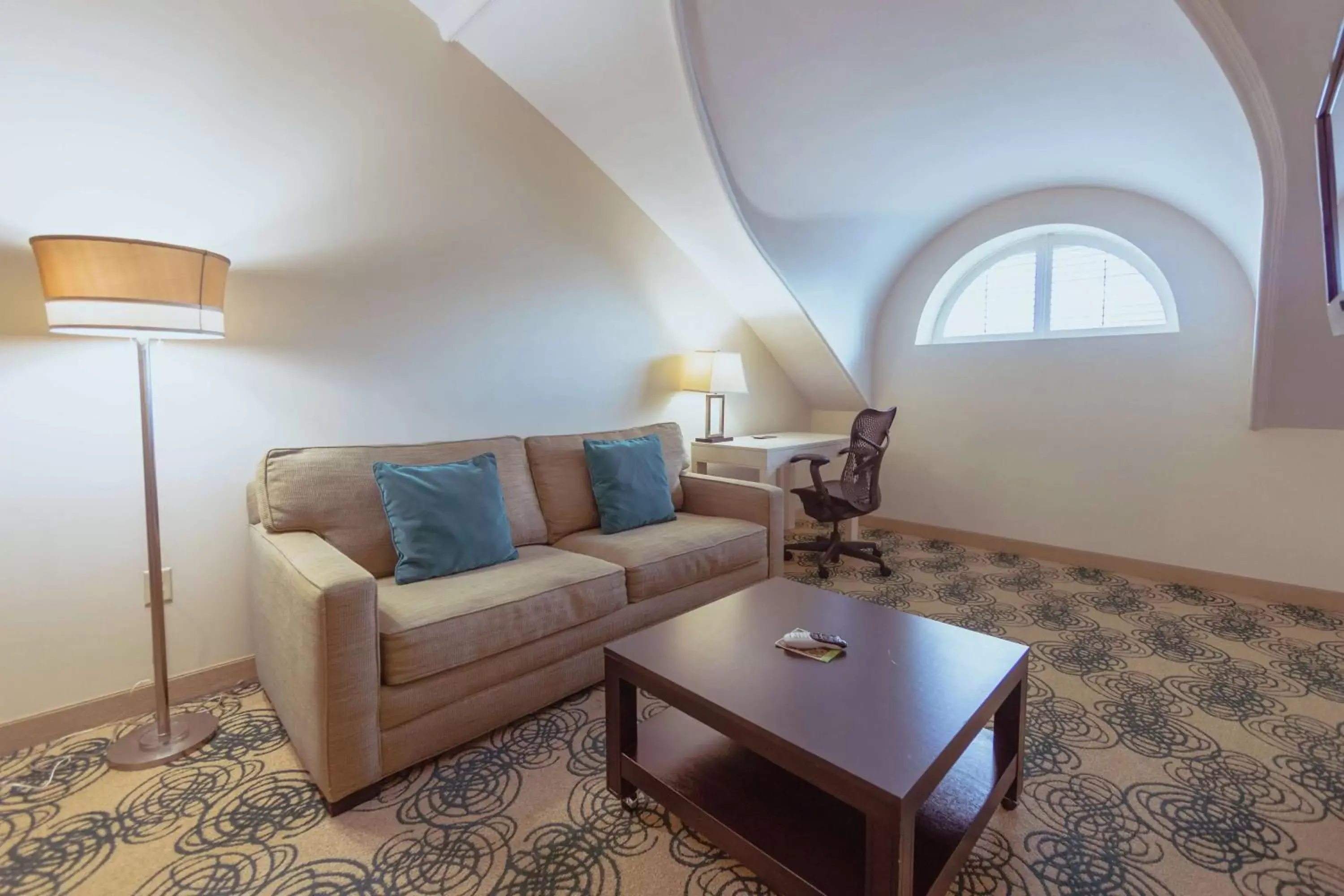 Bedroom, Seating Area in Hotel Skyler Syracuse, Tapestry Collection by Hilton