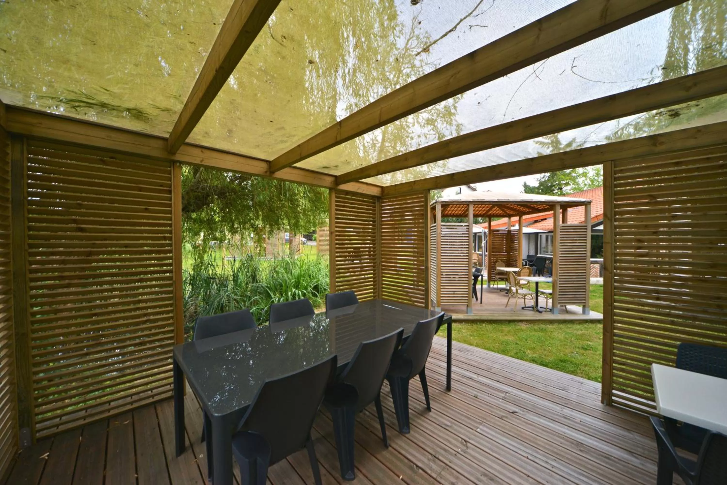 Patio in Logis - Hotel Restaurant La Mire