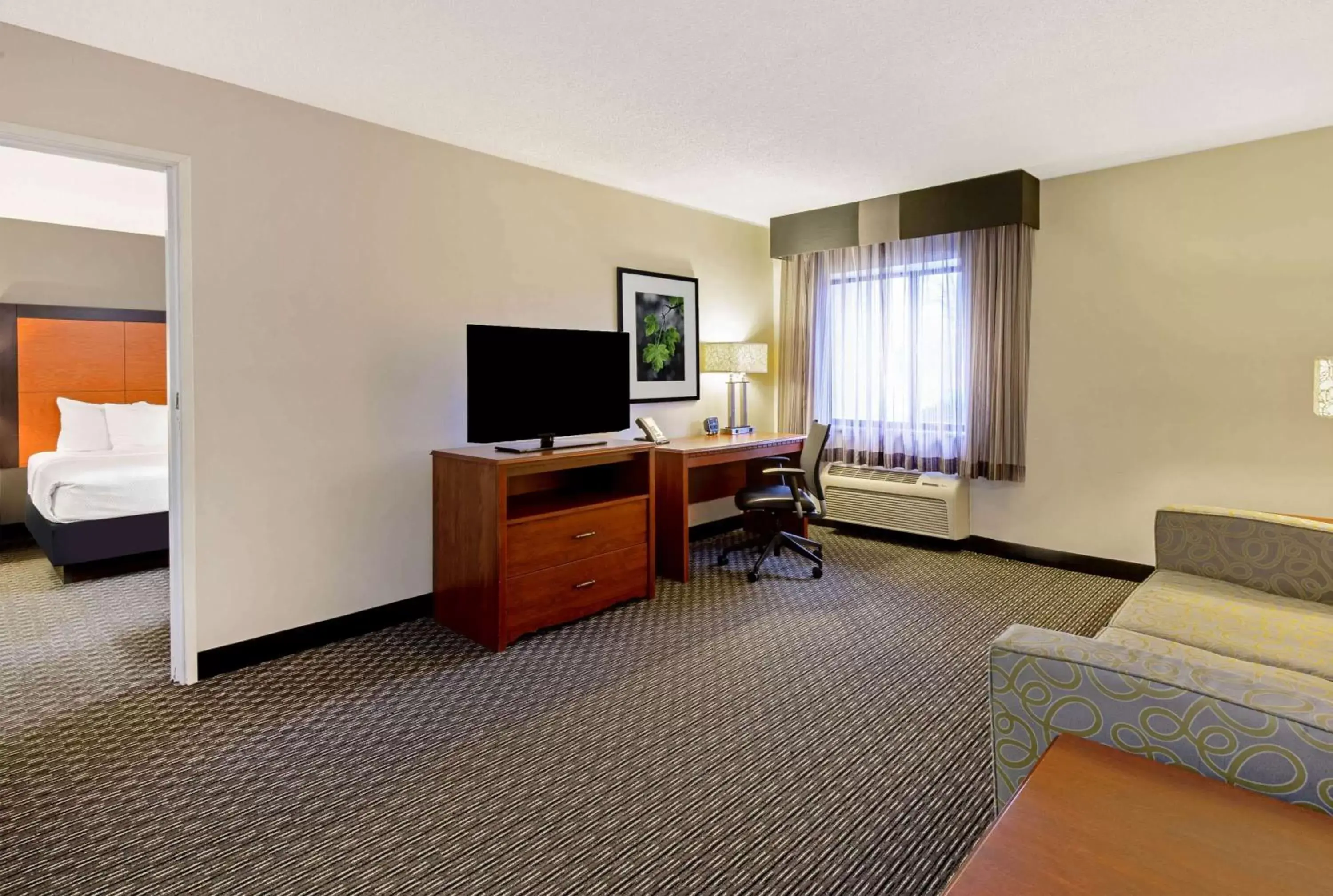 Photo of the whole room, TV/Entertainment Center in La Quinta by Wyndham Harrisburg Airport Hershey