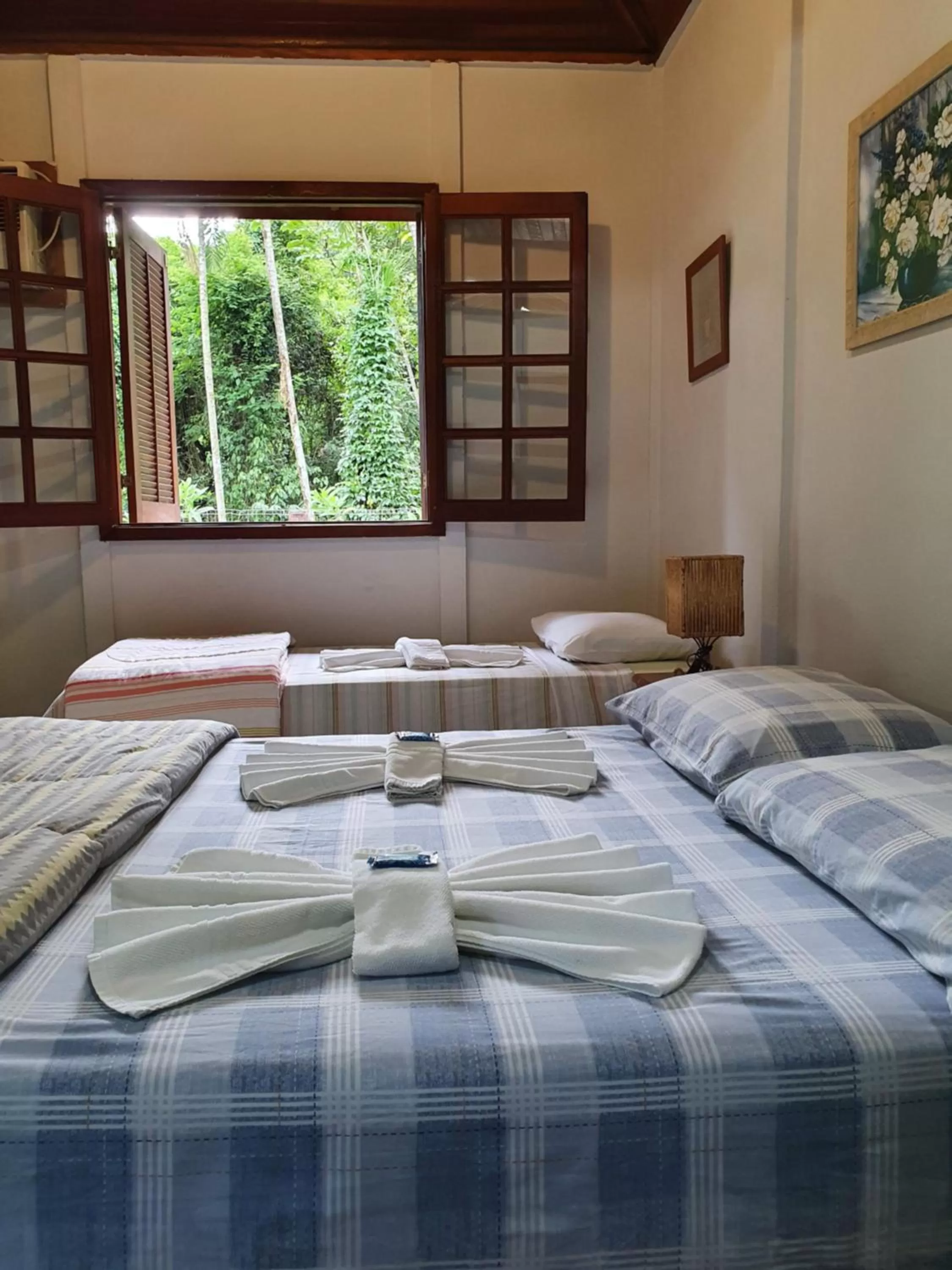 Bed in Pousada Canto do Curió Paraty