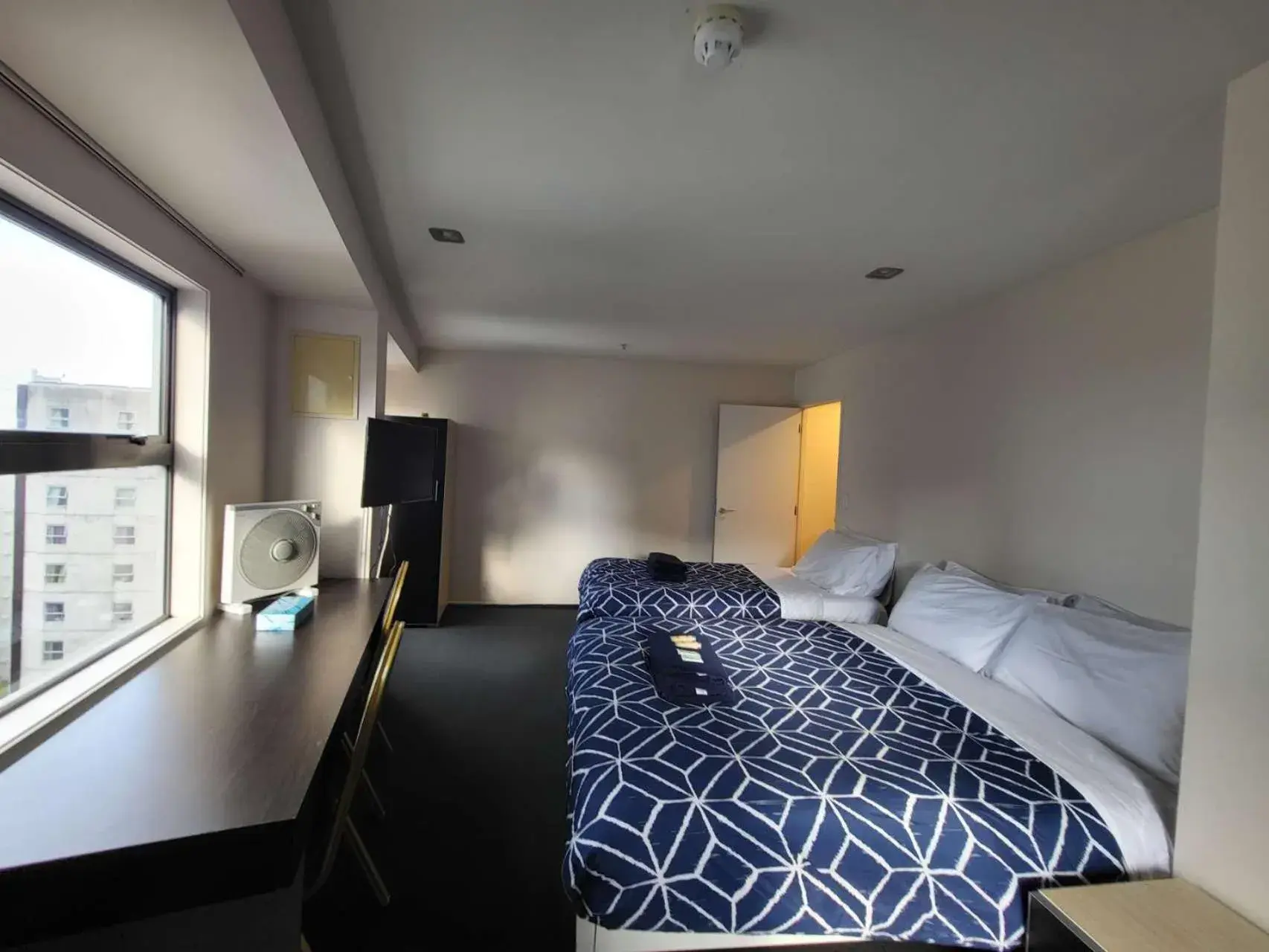 Bed in Empire Apartments Bed in Empire Apartments