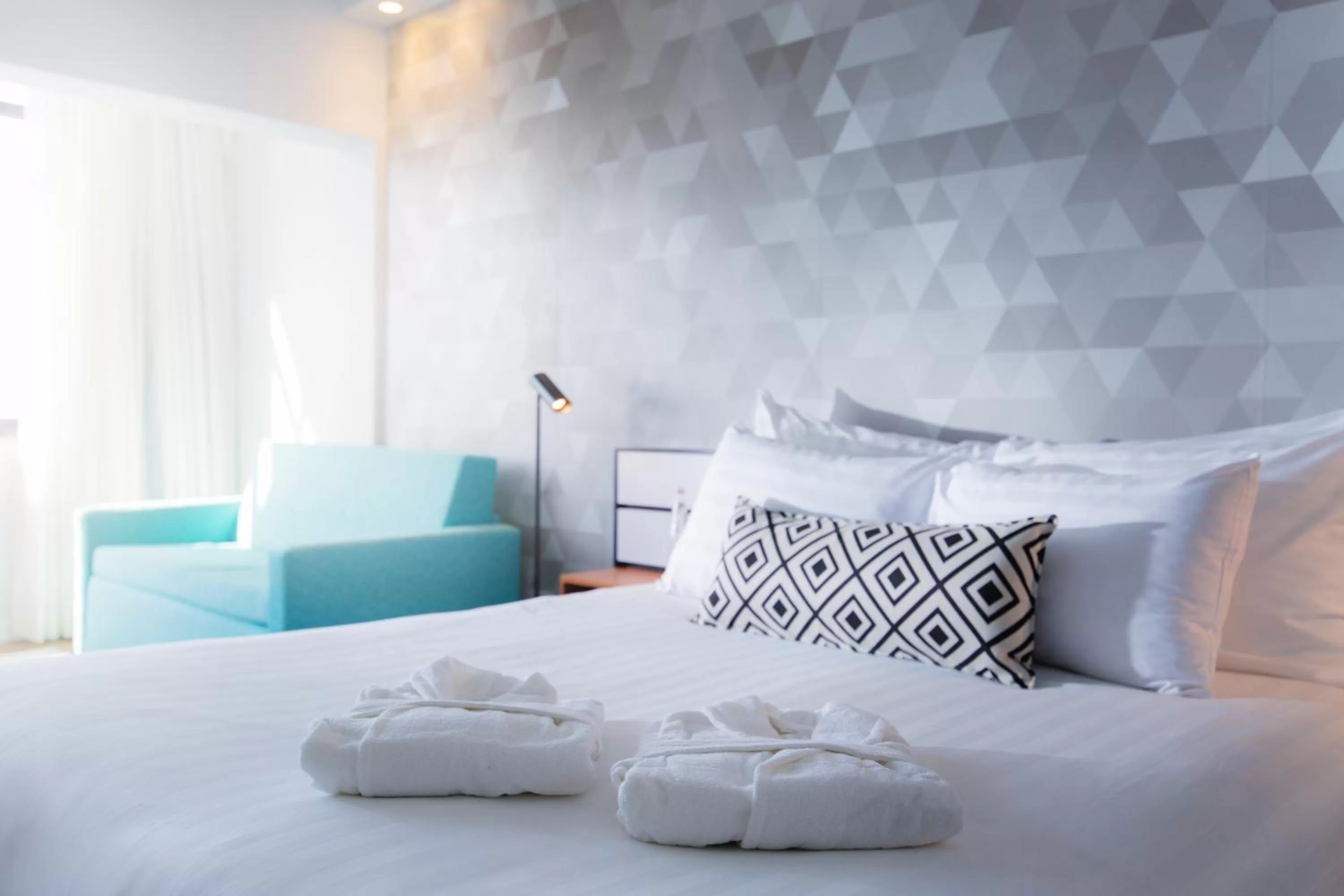 Bedroom, Bed in Prima Tel Aviv Hotel