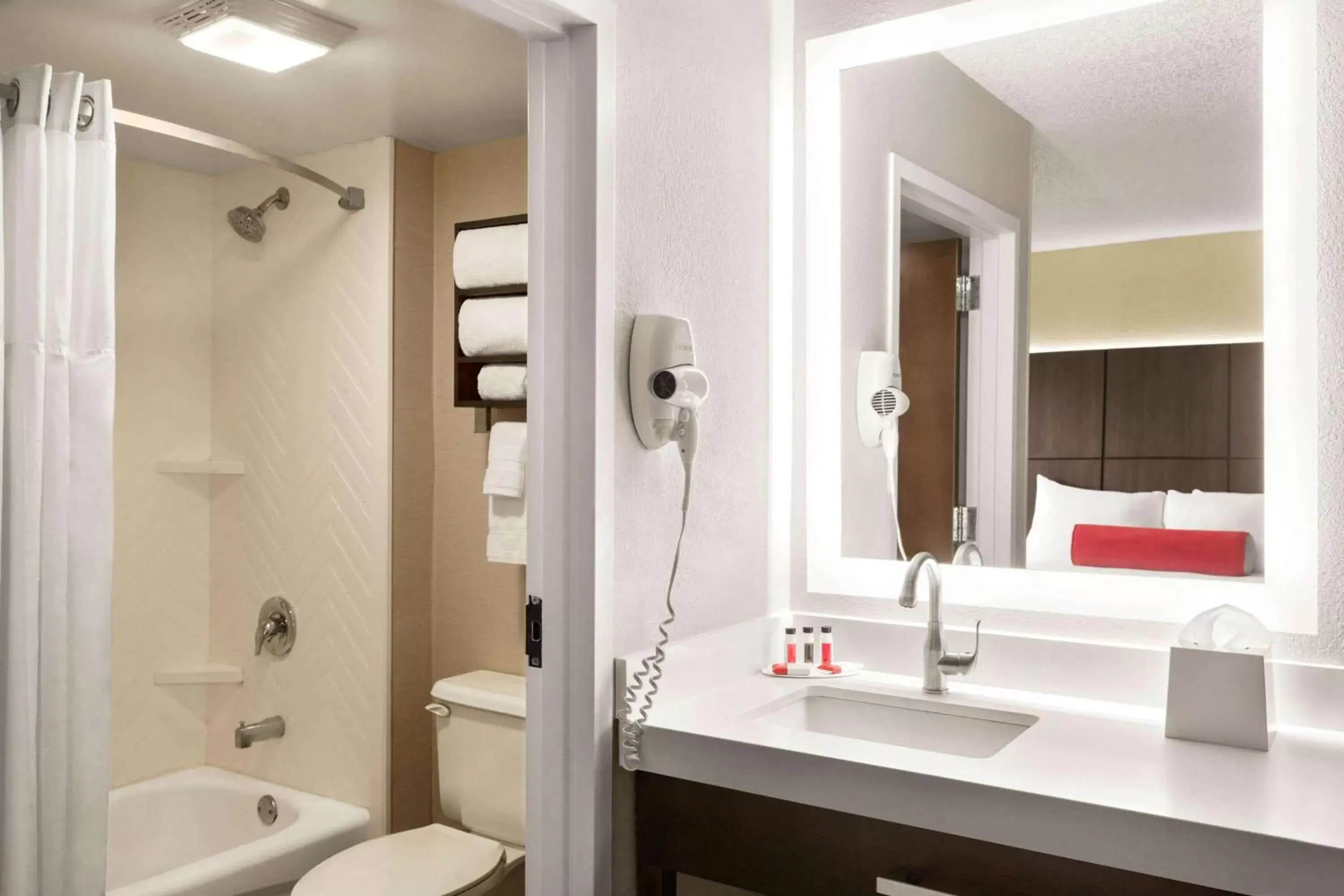 Bathroom in Ramada by Wyndham Suites Orlando Airport
