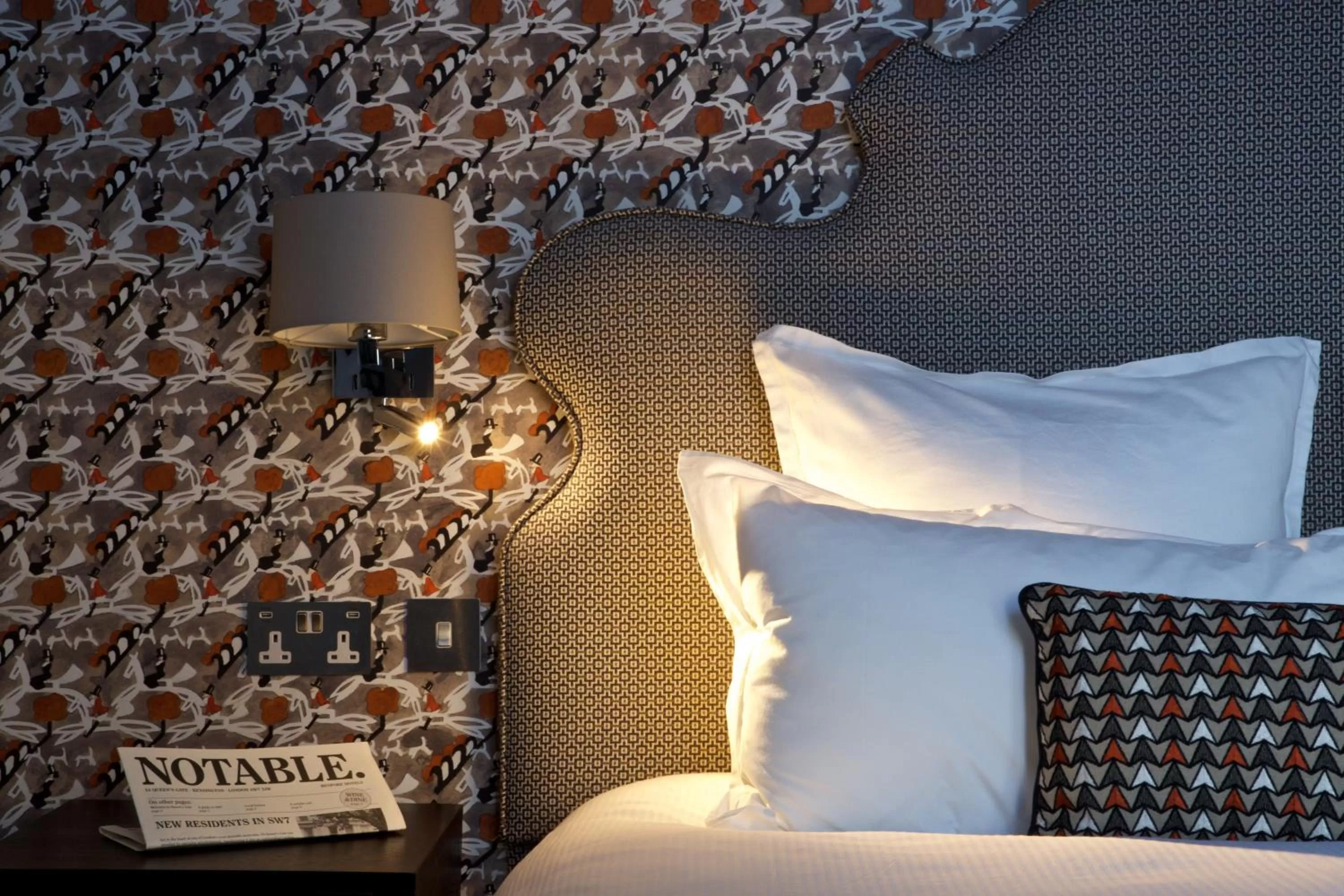 Bed in 54 Queen's Gate Hotel