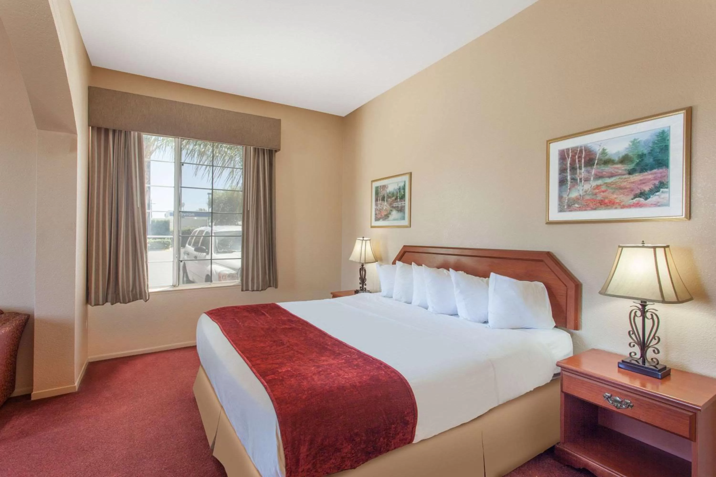Photo of the whole room, Bed in Ramada by Wyndham Fresno Northwest