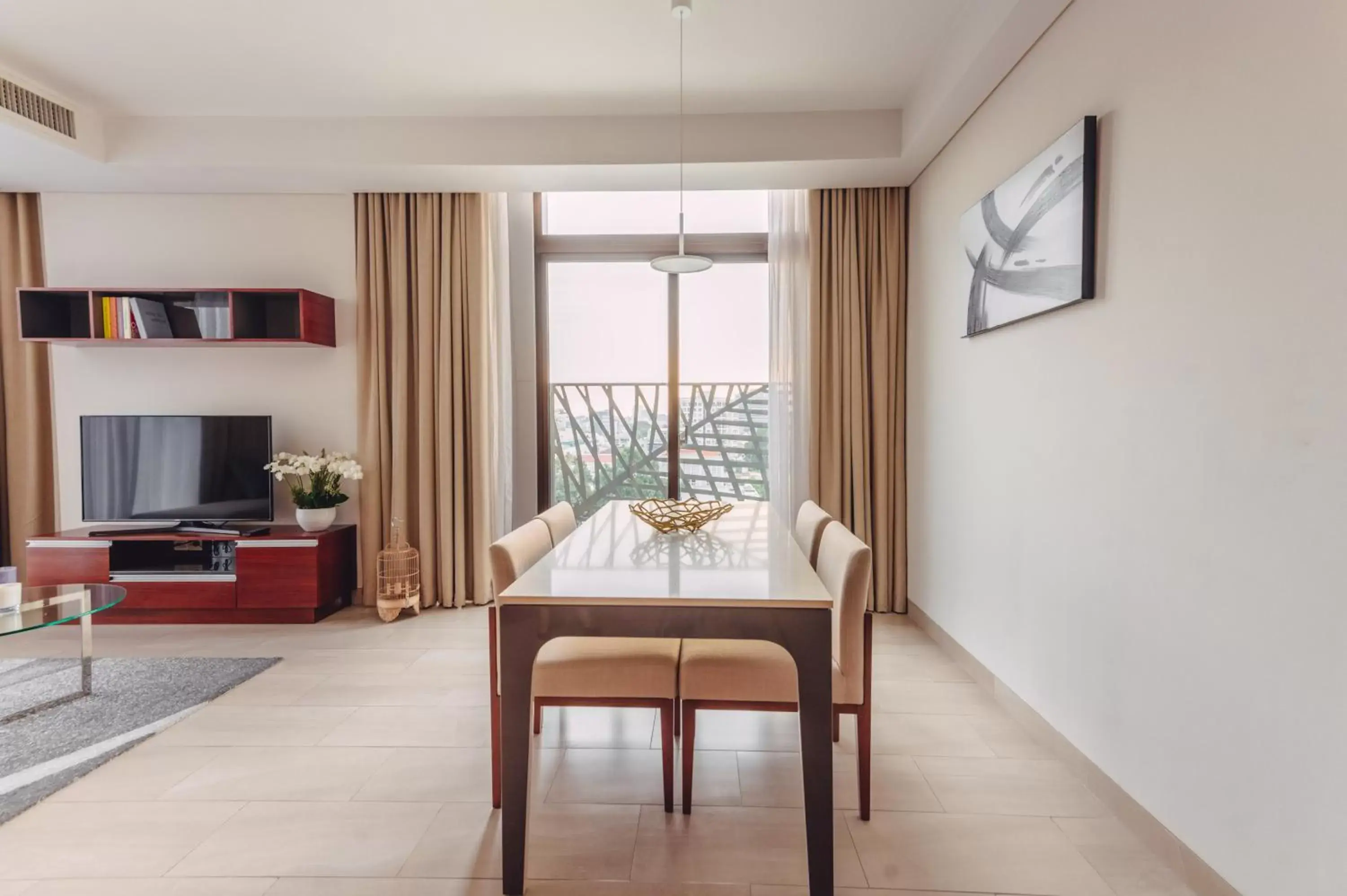 Dining area, TV/Entertainment Center in SILA Urban Living