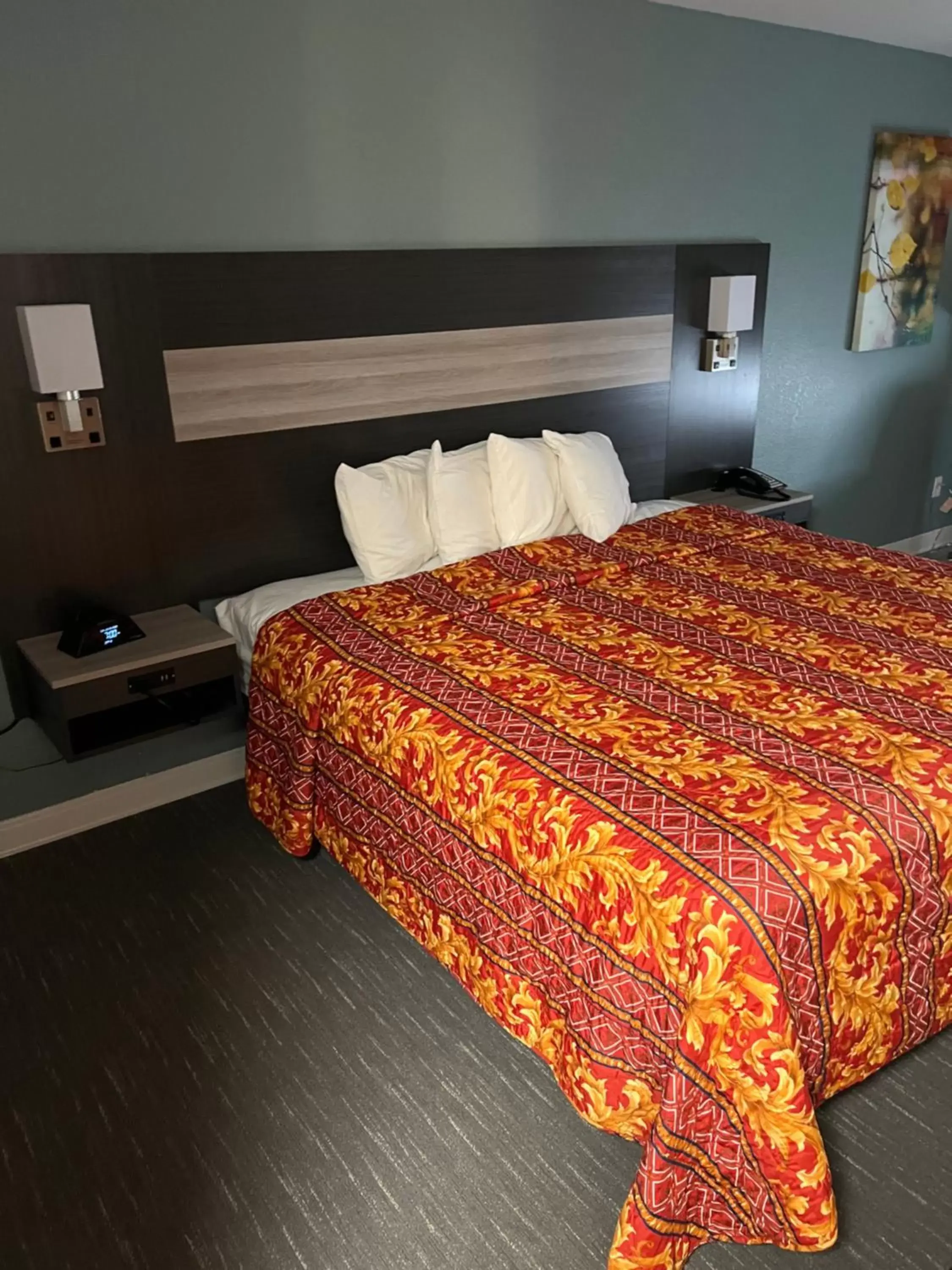 Bed in Prime Inn & Suites Poteau