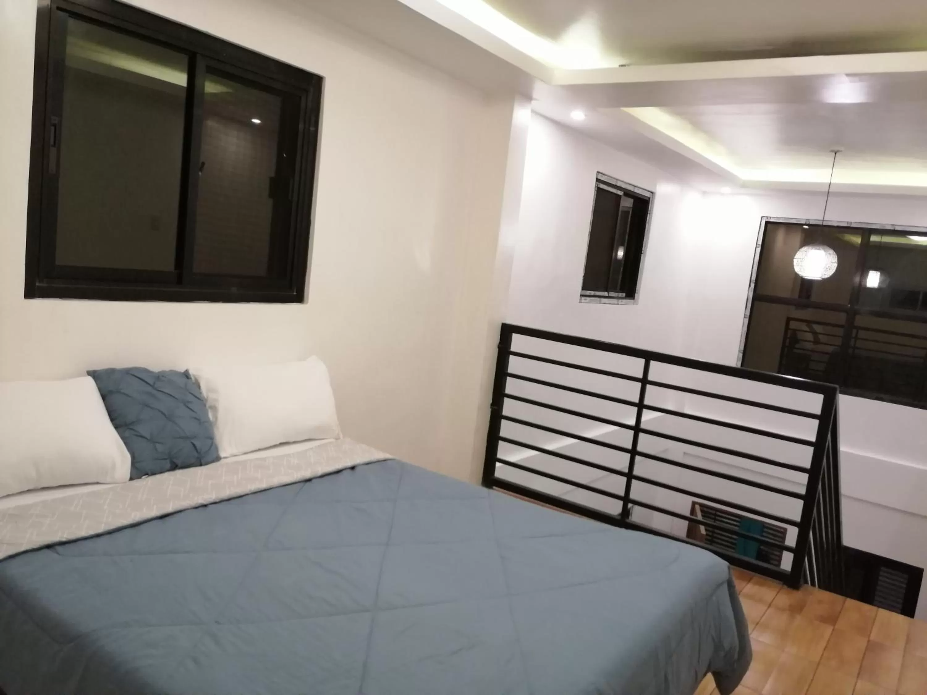 Bed in Purple Orchid Bed and Breakfast