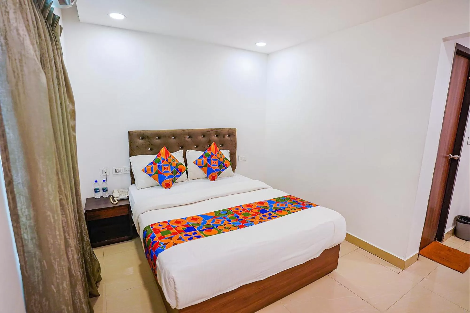 Bed in FabHotel Earth