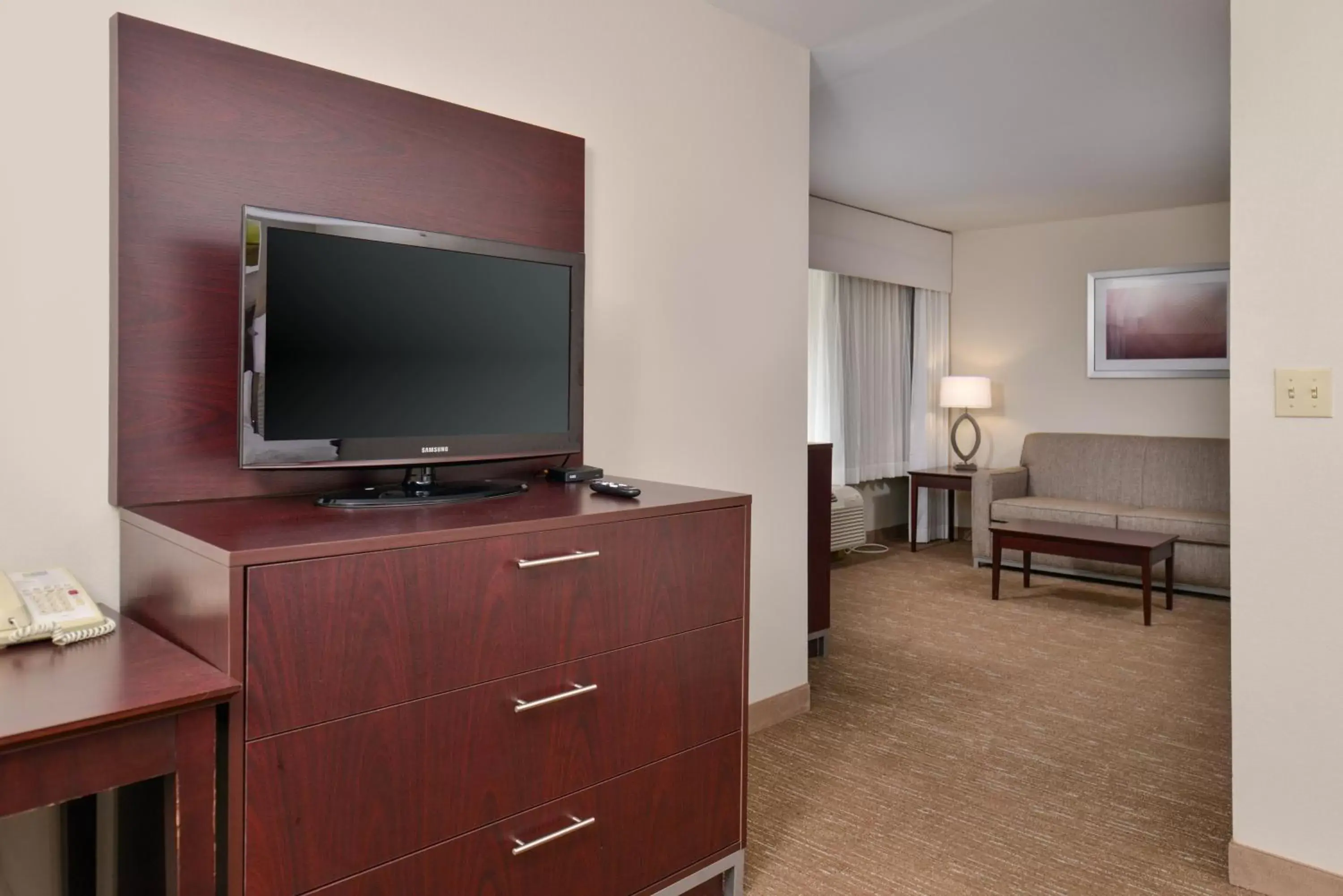 Photo of the whole room, TV/Entertainment Center in Holiday Inn Express Hotel & Suites Lafayette, an IHG Hotel