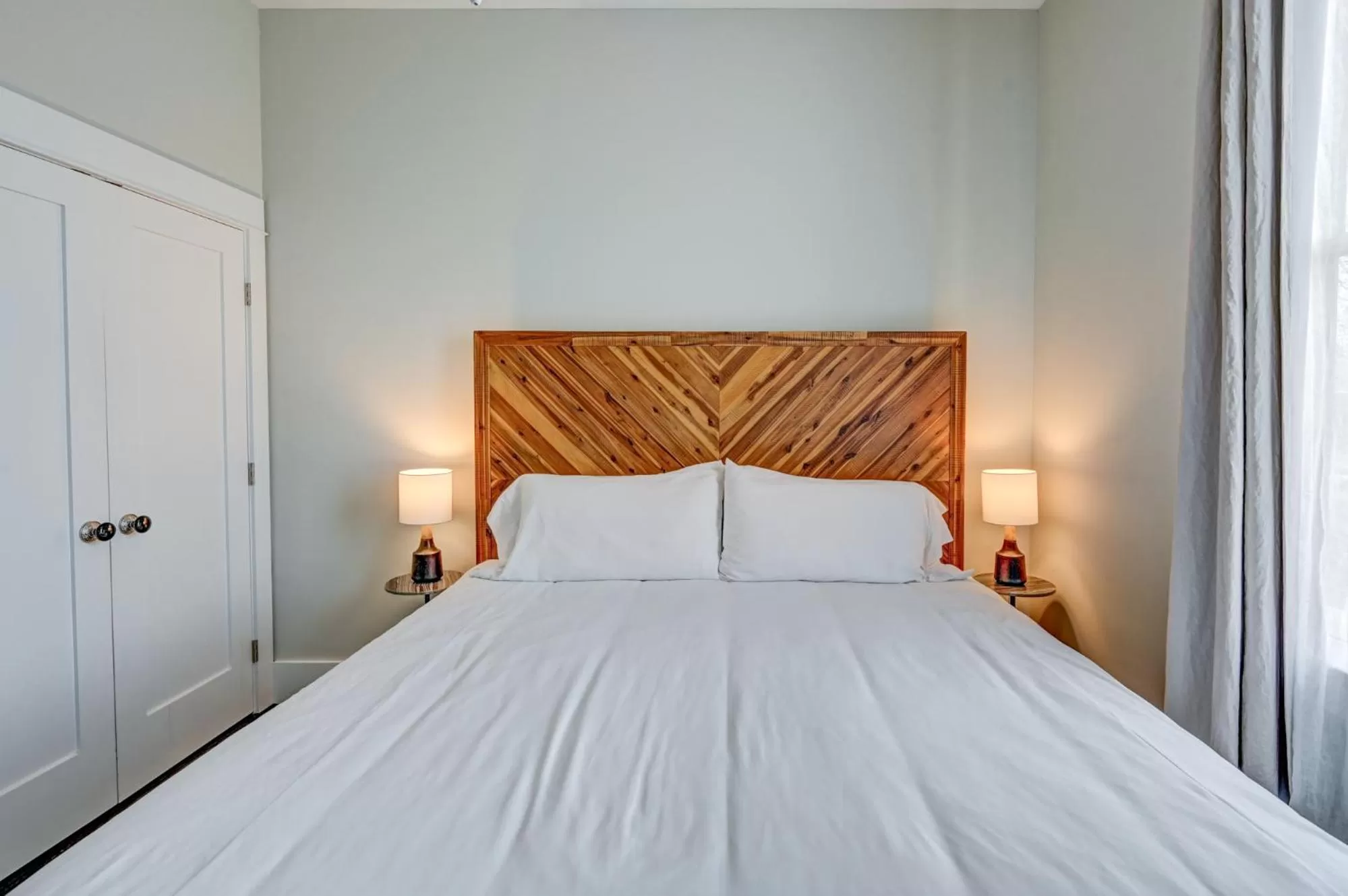 Bed in South Main Residences by Surf Hotel