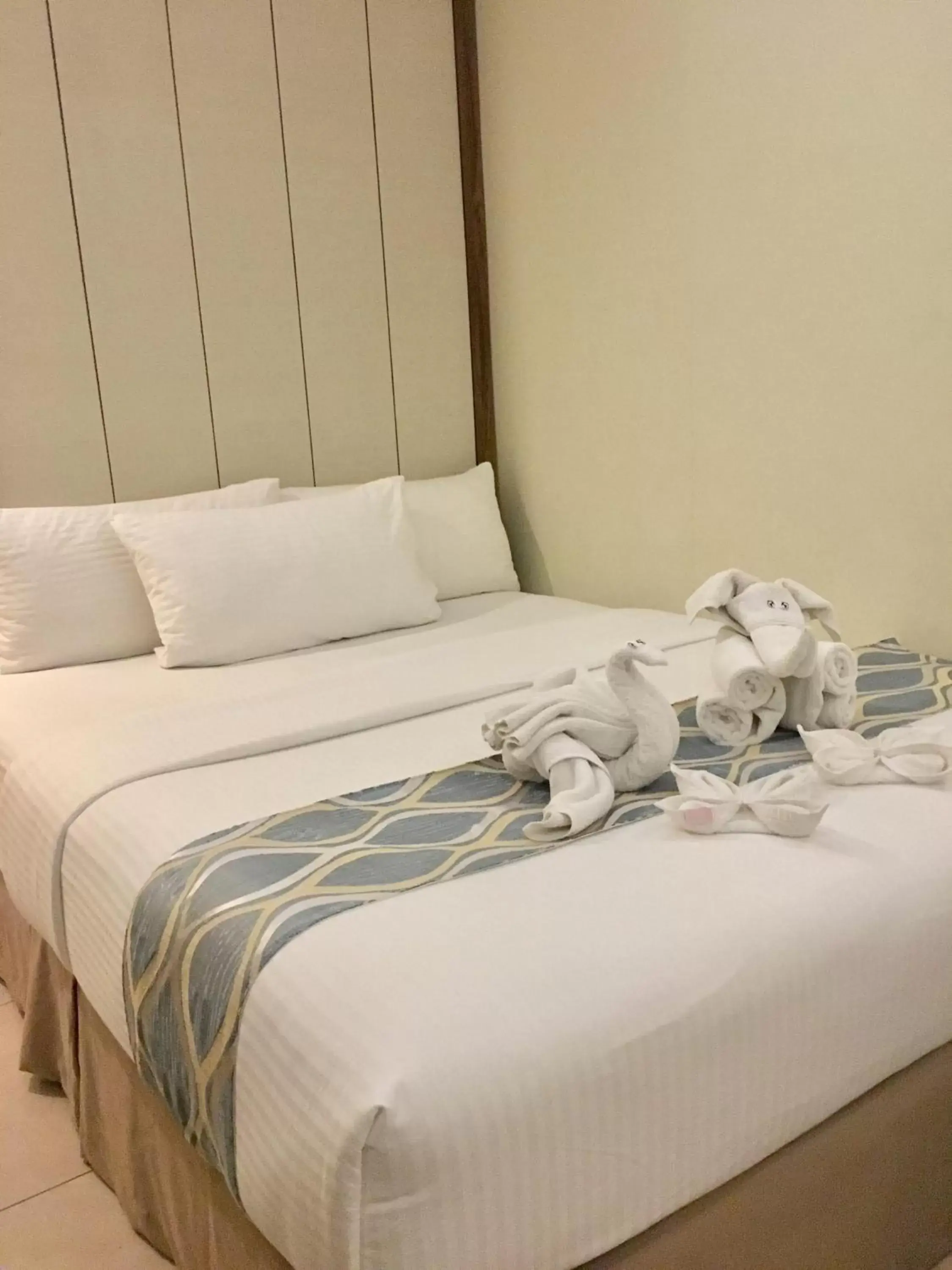 Bed in Belian Hotel