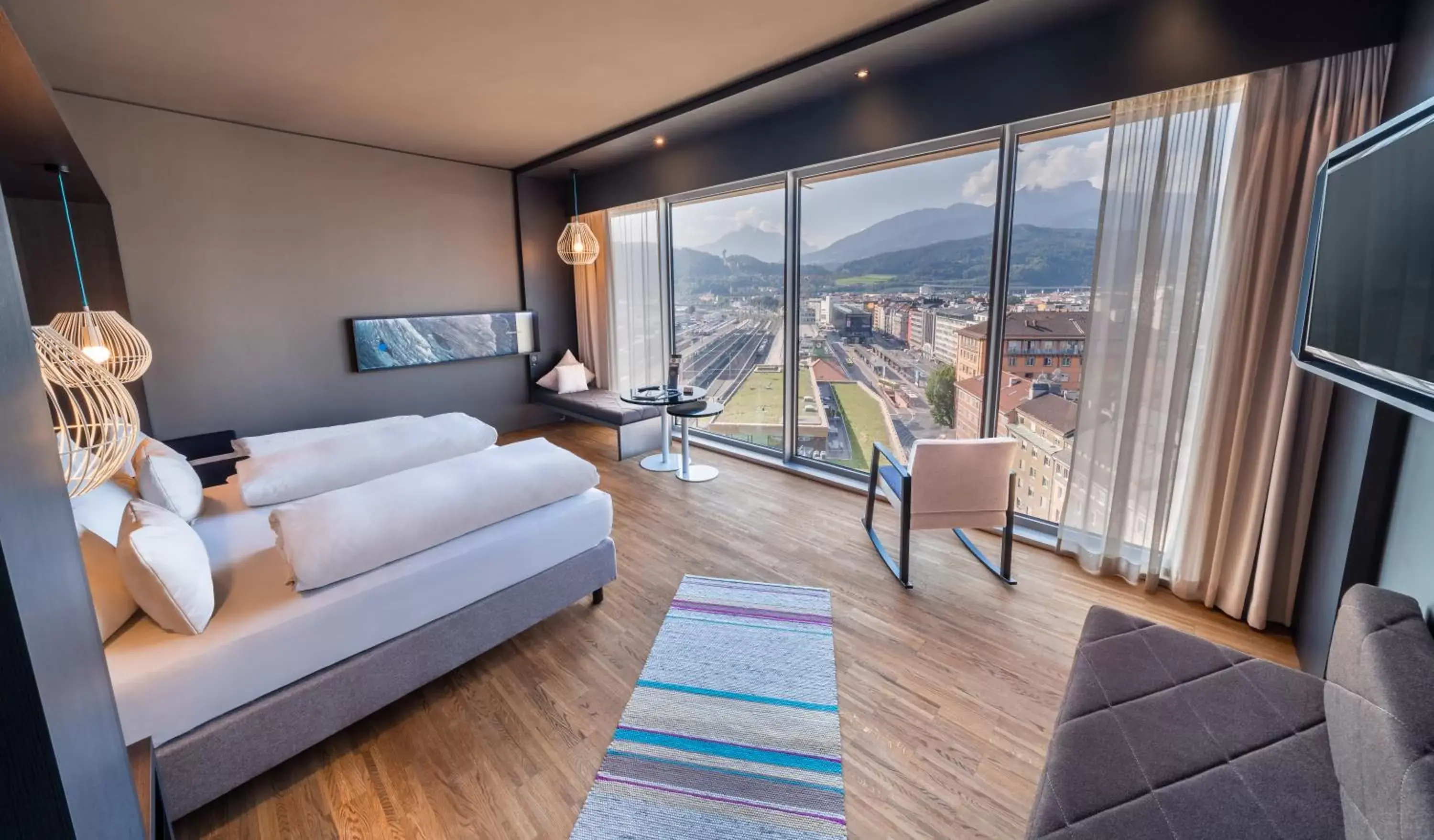 Bed, Seating Area in aDLERS Hotel Innsbruck